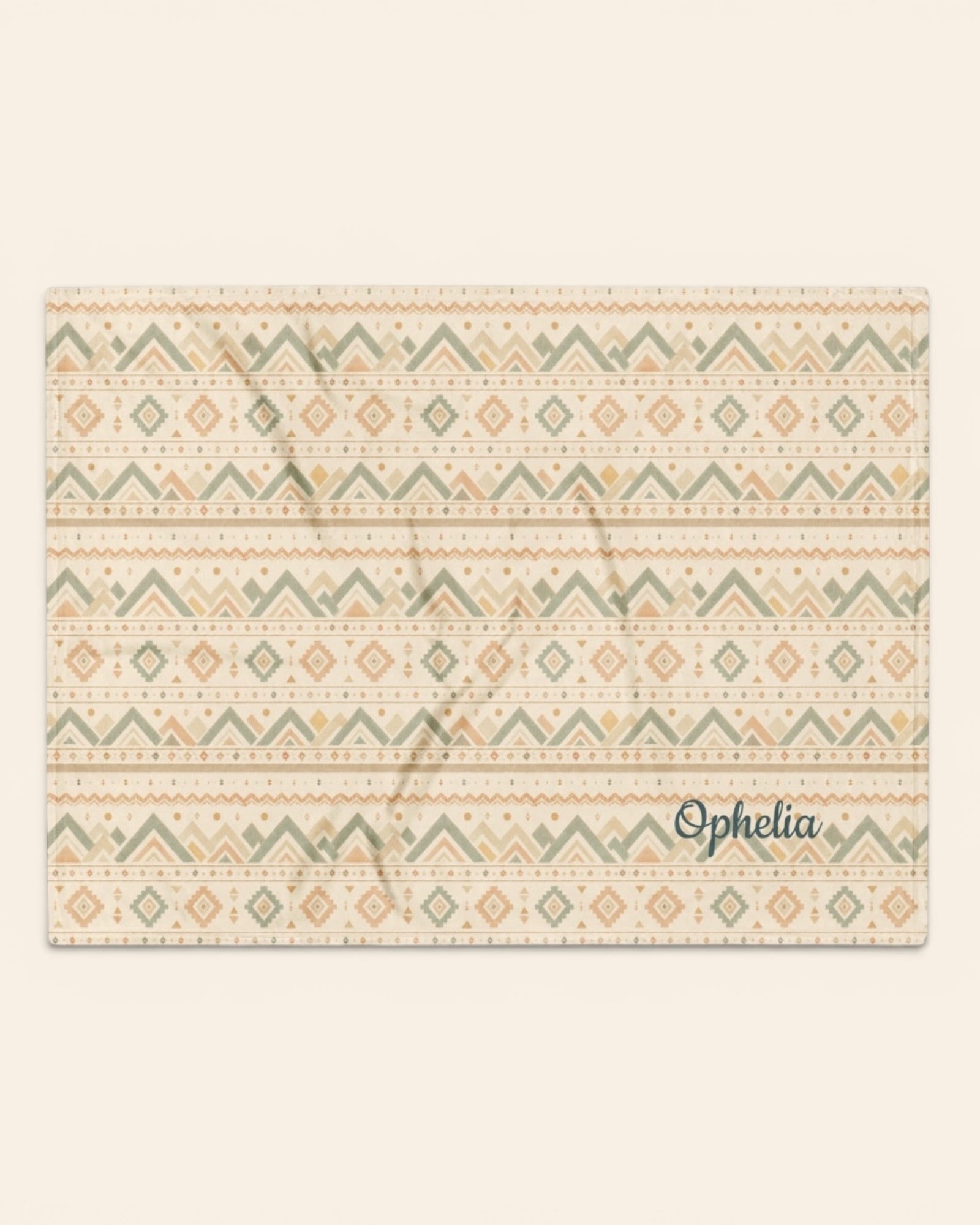 Where The Mountains Wait Throw Blanket, with mountain-inspired geometric bands in sage, sand, and peach print