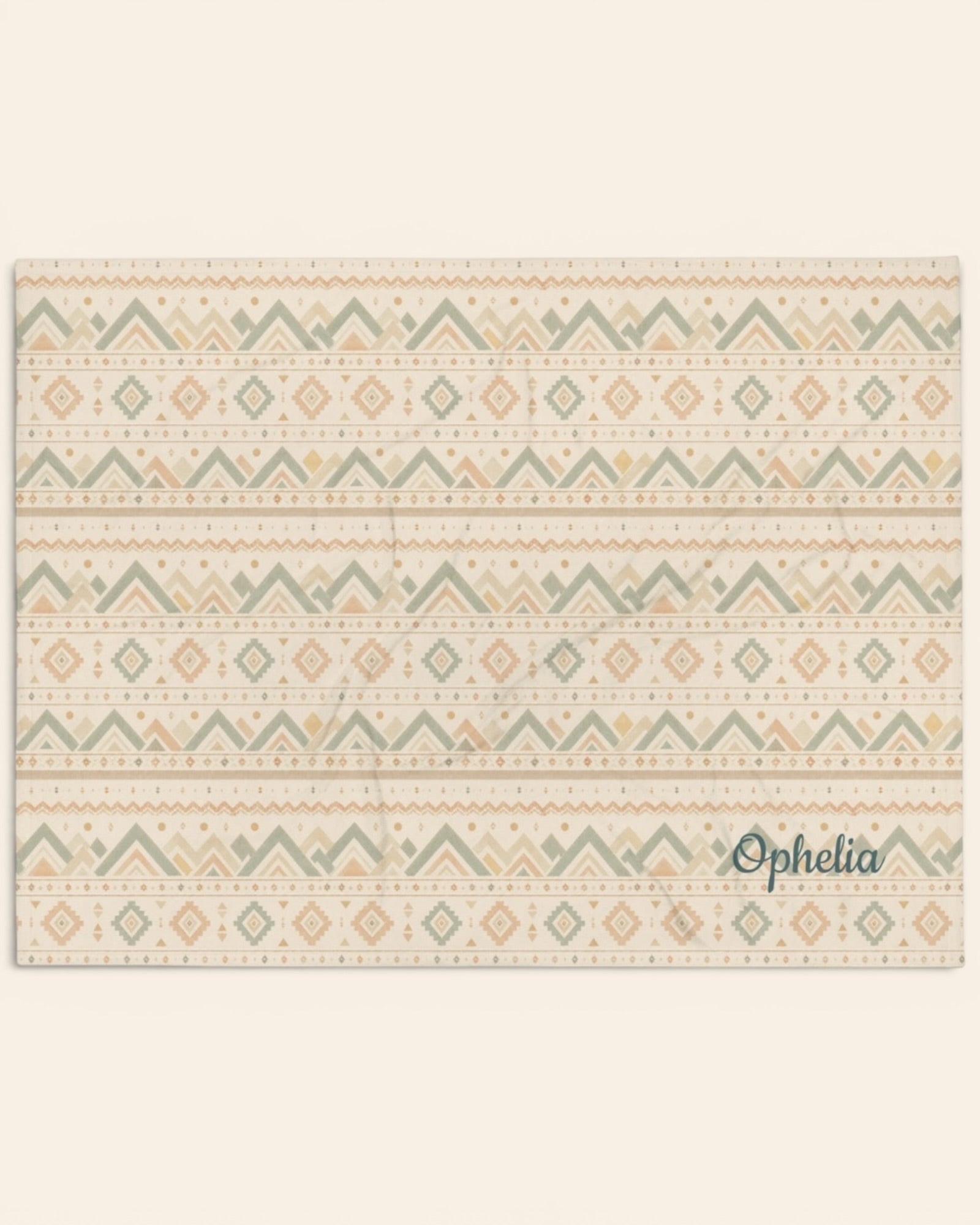 Where The Mountains Wait Throw Blanket, with mountain-inspired geometric bands in sage, sand, and peach print