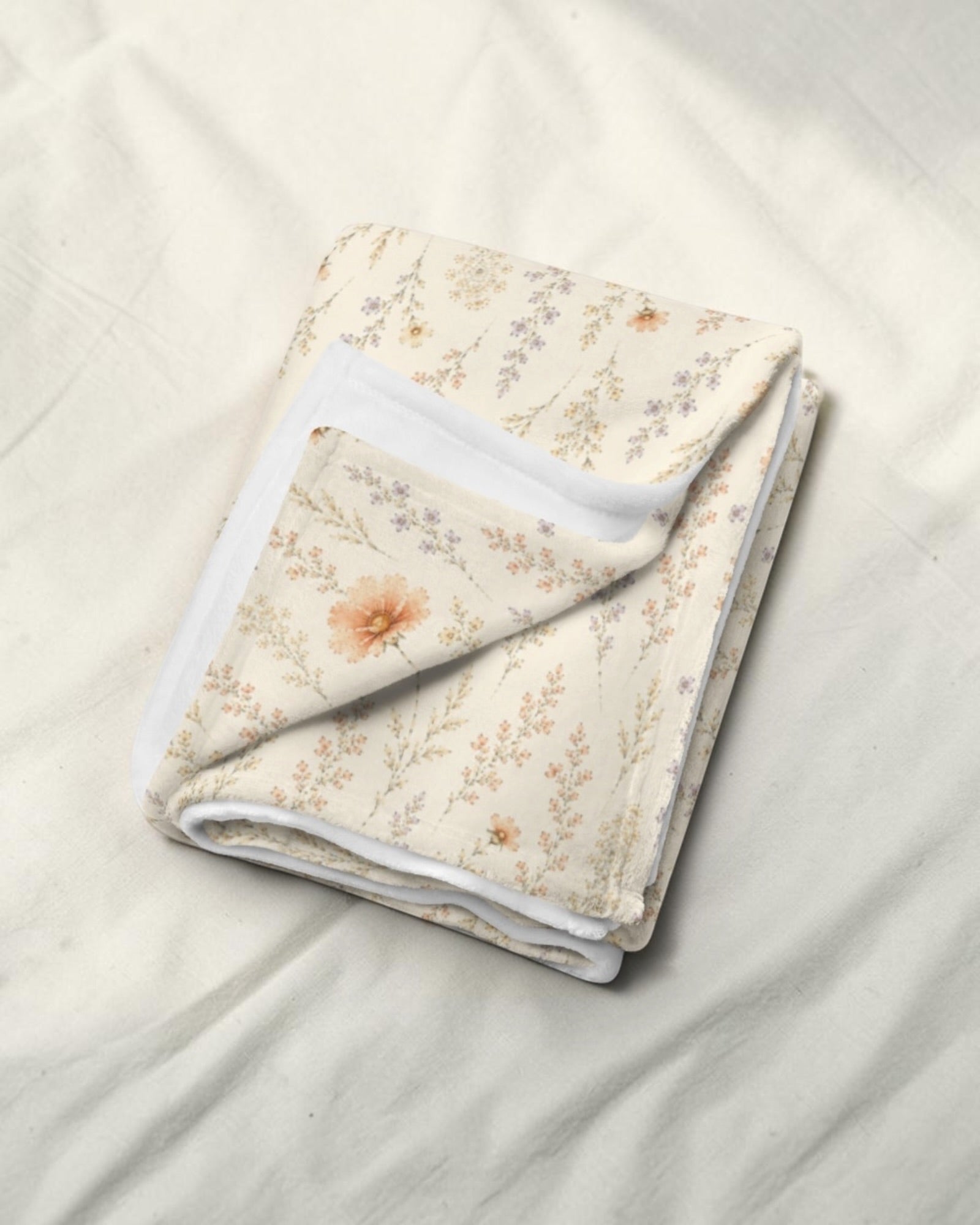 Wildflower Dreams Throw Blanket, with apricot cosmos, larkspur, baby's breath, and golden stems print