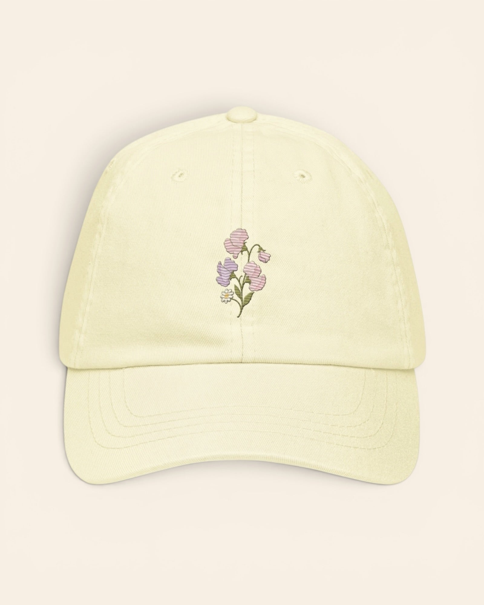 April birth flower hat with embroidered sweet pea and daisy, in Pastel Lemon