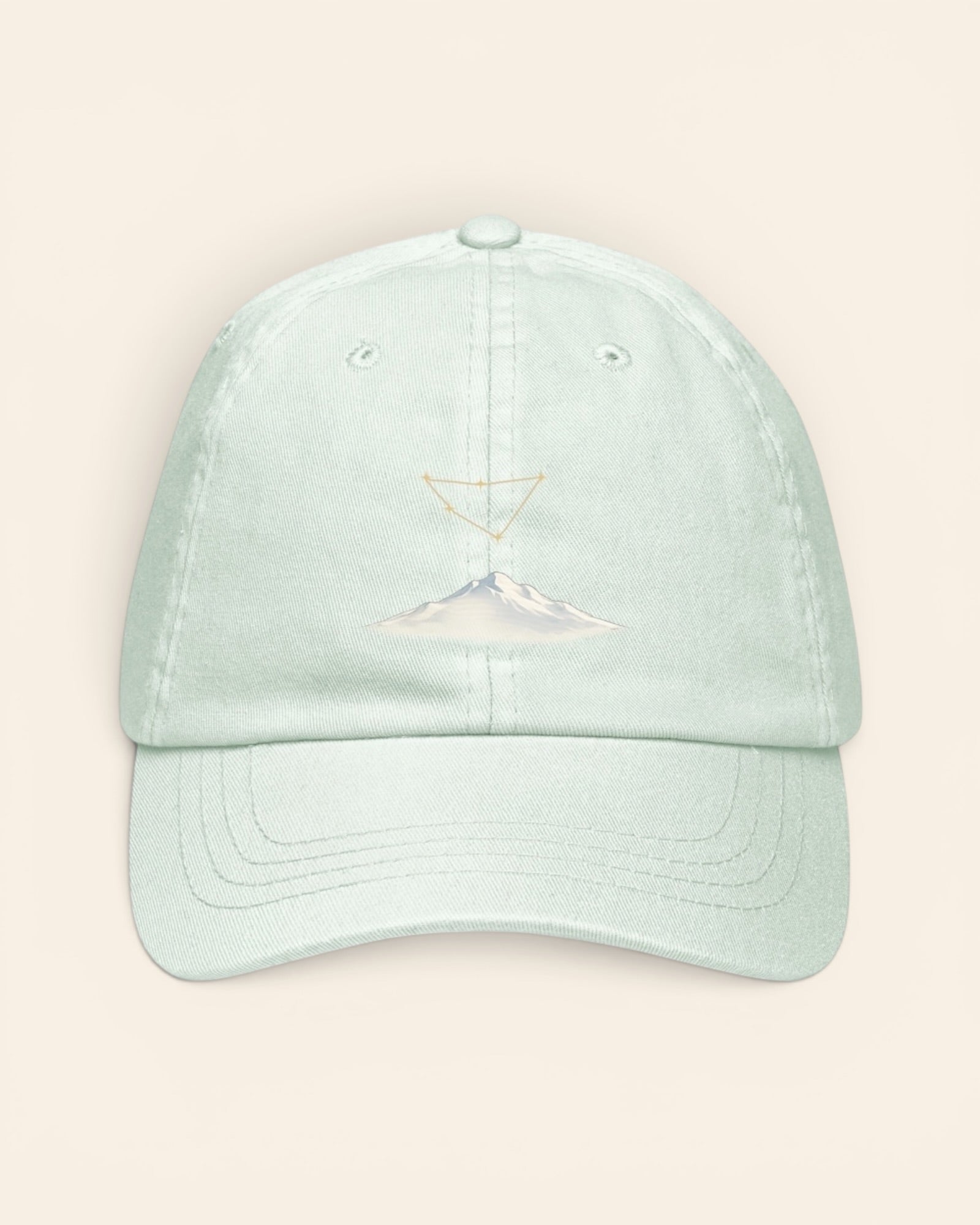 Capricorn constellation hat with embroidered stars above a mountain ridge, in Pastel Mint