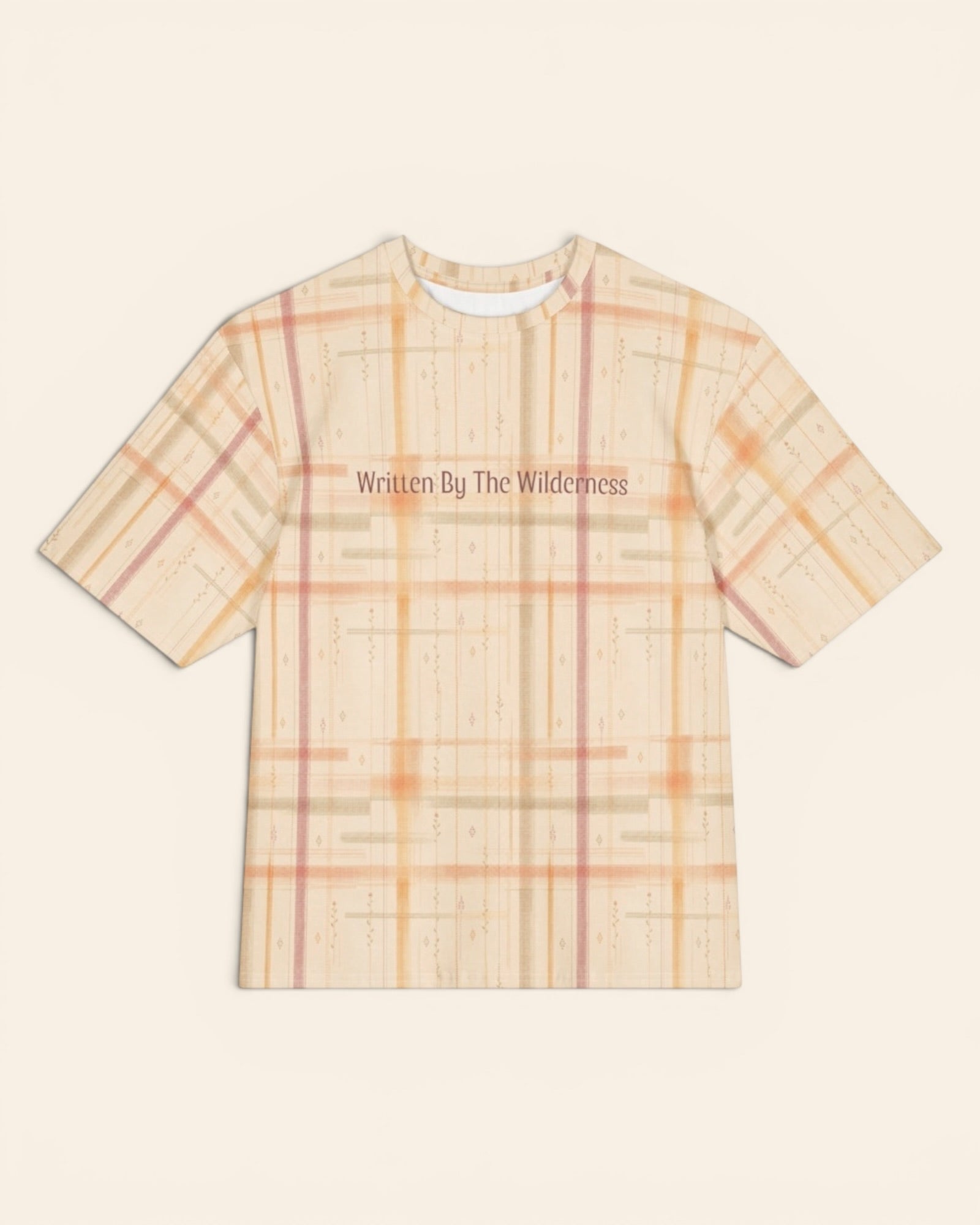 Written By The Wilderness Oversized Tee, with vintage-inspired woven plaid in apricot, sage, and peach print