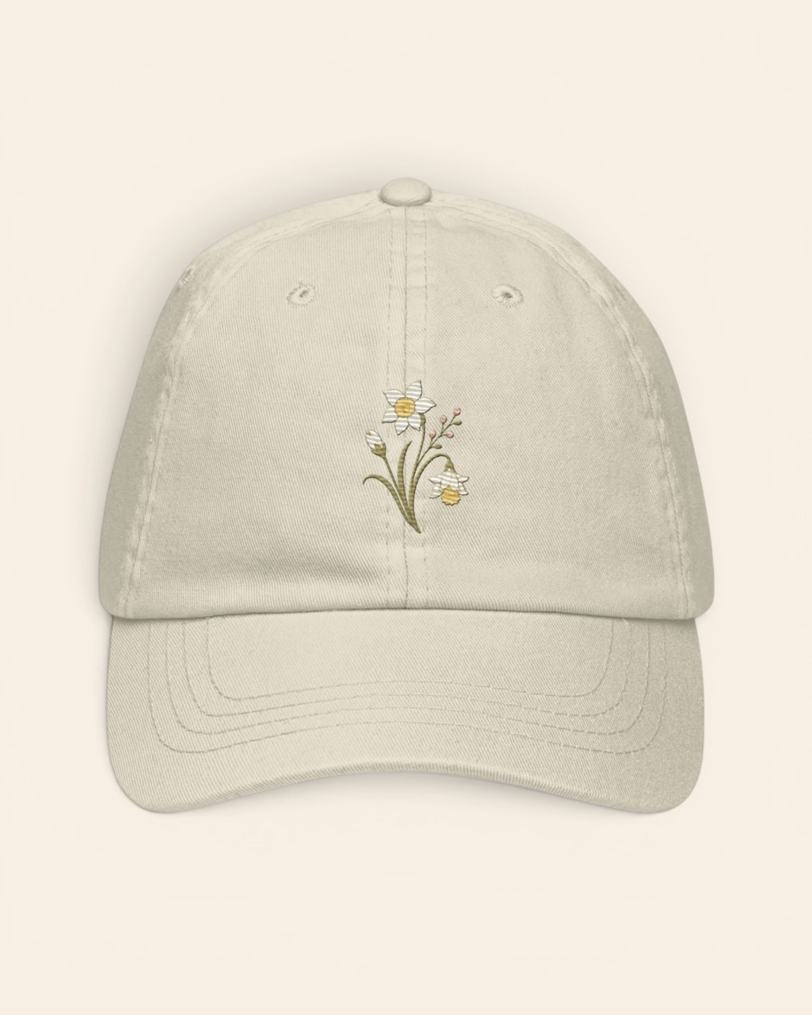 December birth flower hat with embroidered narcissus and holly, in Beige