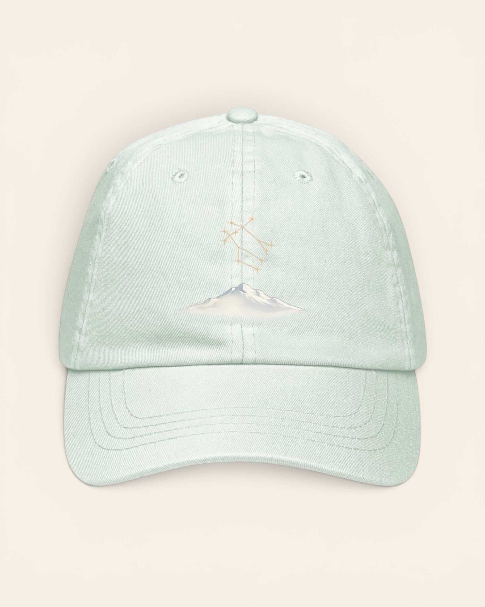 Gemini constellation hat with embroidered stars above a mountain ridge, in Pastel Mint