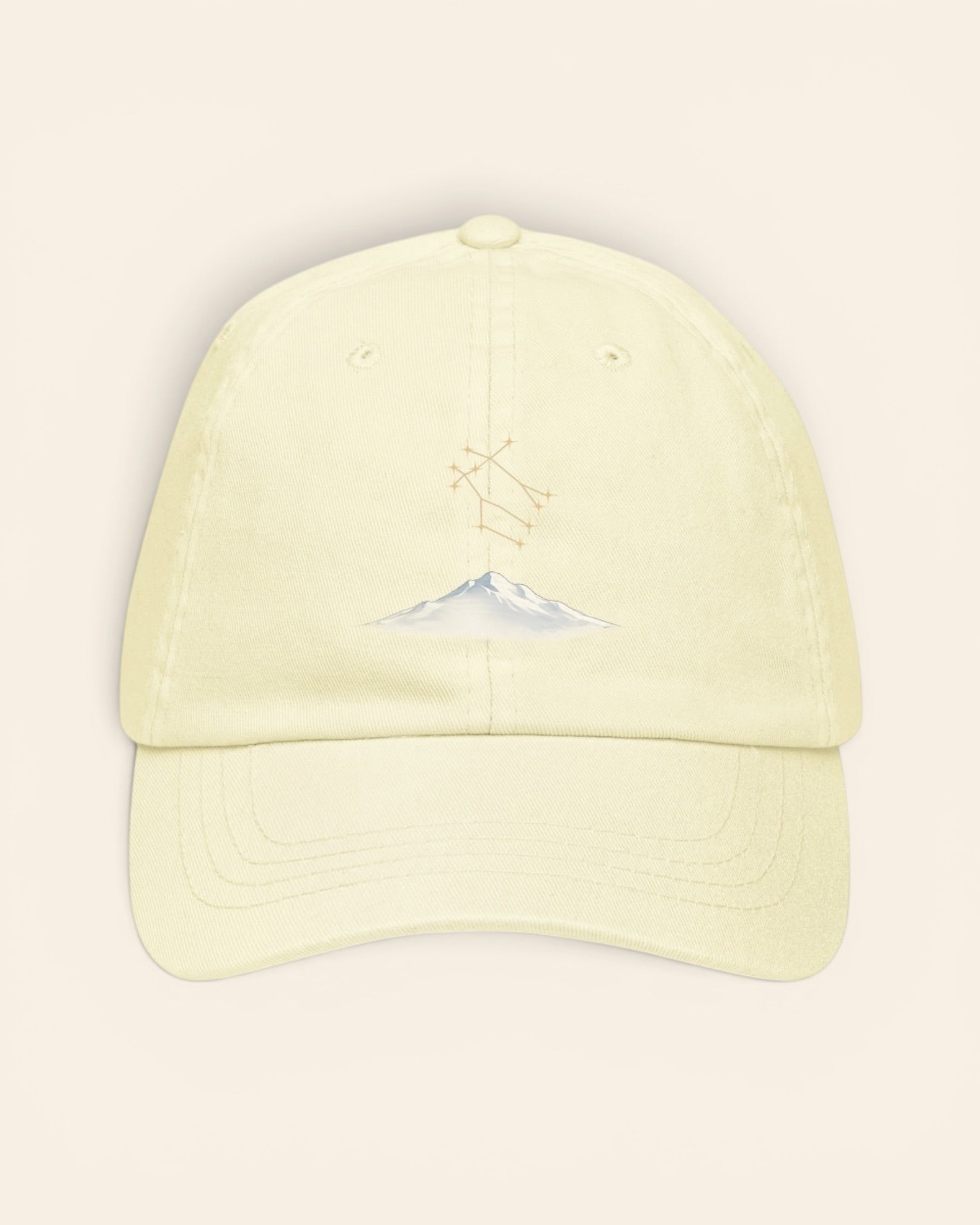Gemini constellation hat with embroidered stars above a mountain ridge, in Pastel Lemon