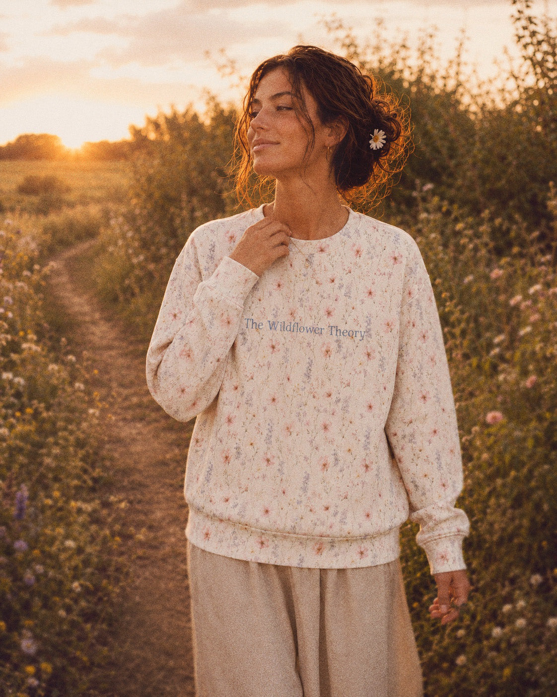 The Wildflower Theory Crewneck Sweatshirt, with blush cosmos, cottage roses, larkspur, and baby's breath print