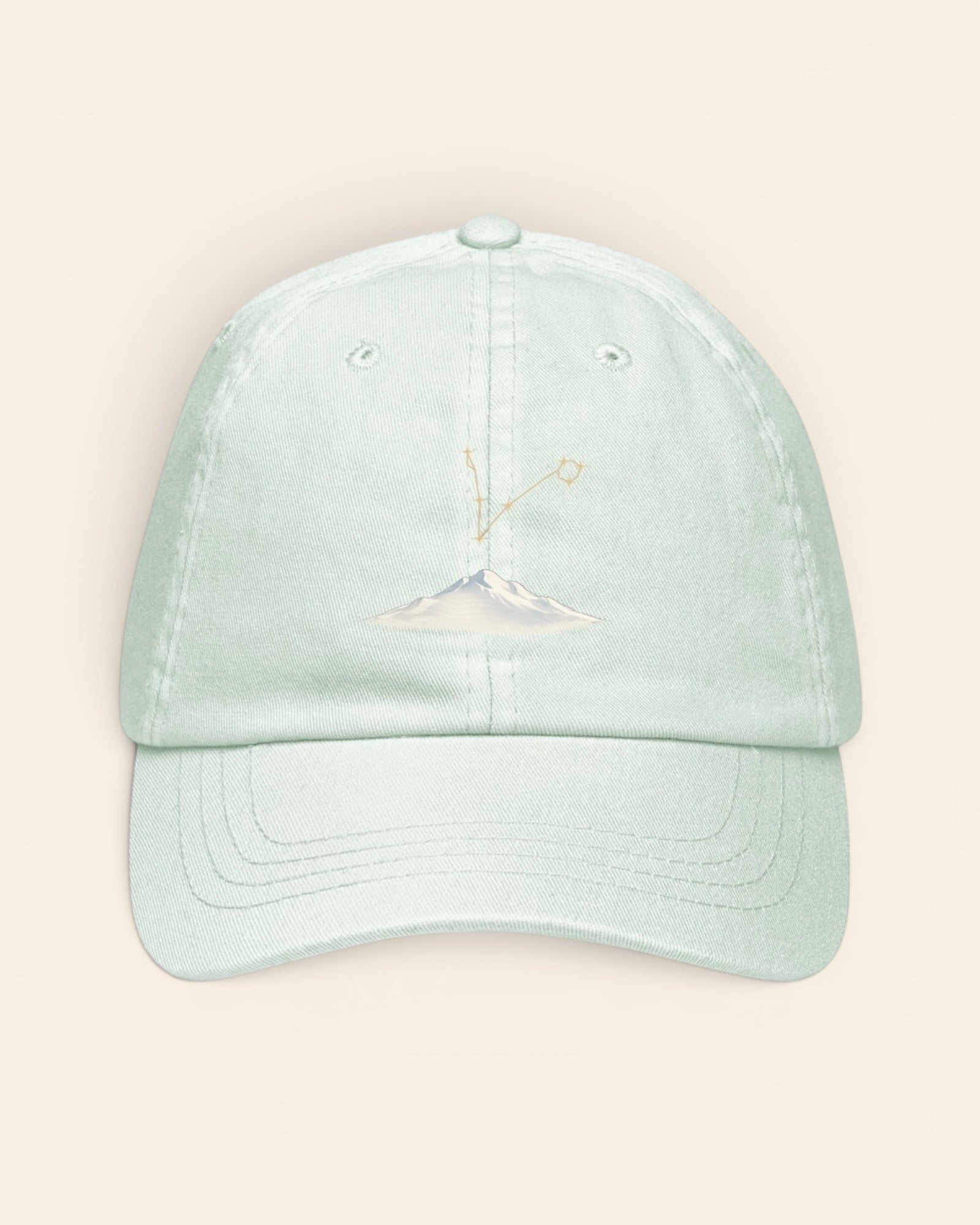 Pisces constellation hat with embroidered stars above a mountain ridge, in Pastel Mint