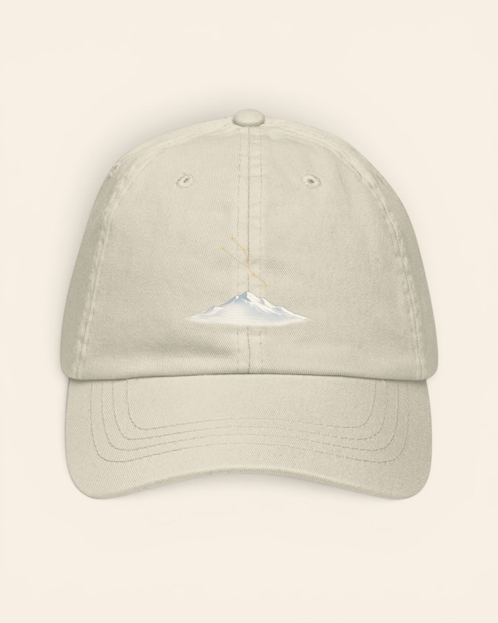 Taurus constellation hat with embroidered stars above a mountain ridge, in Beige