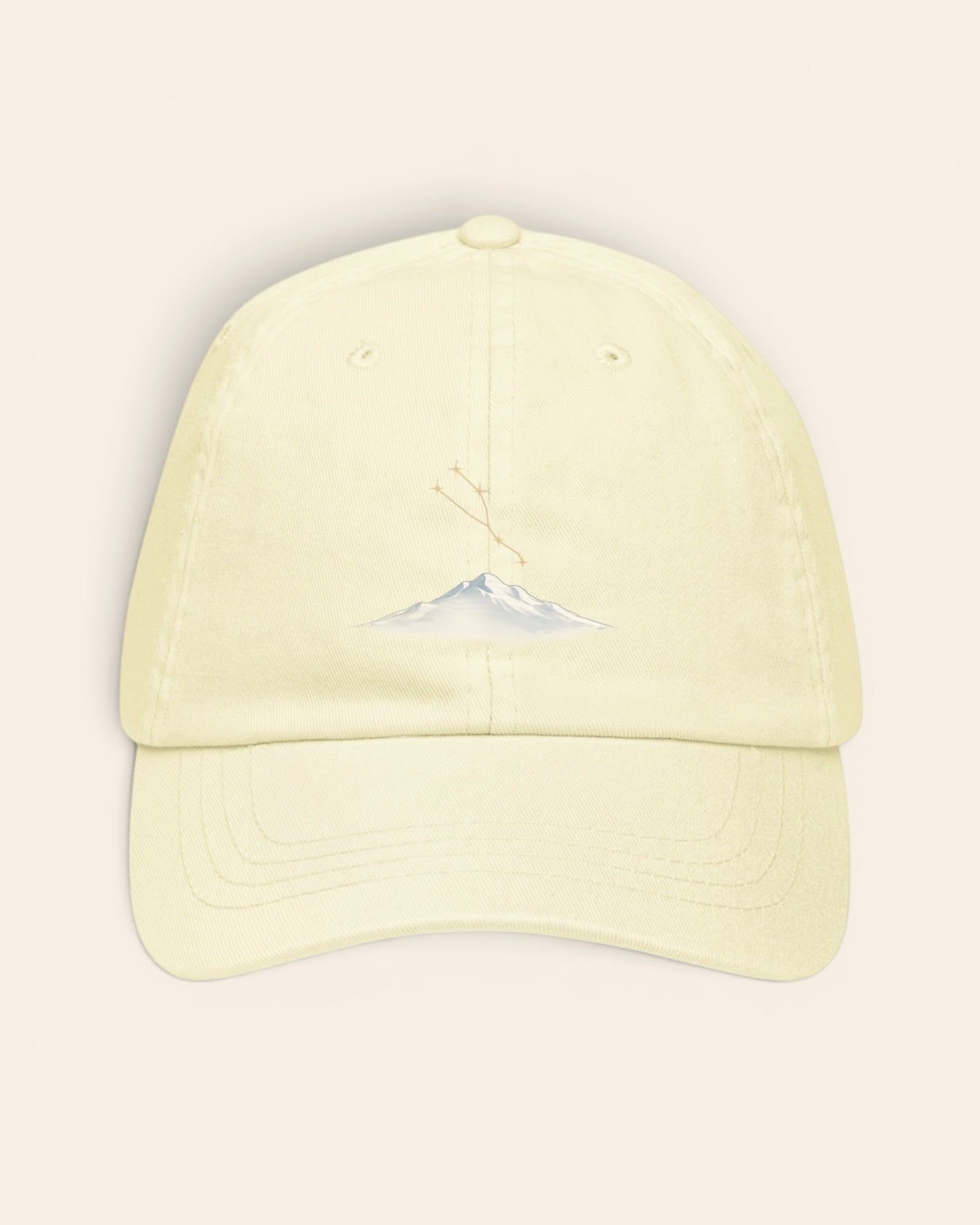Taurus constellation hat with embroidered stars above a mountain ridge, in Pastel Lemon