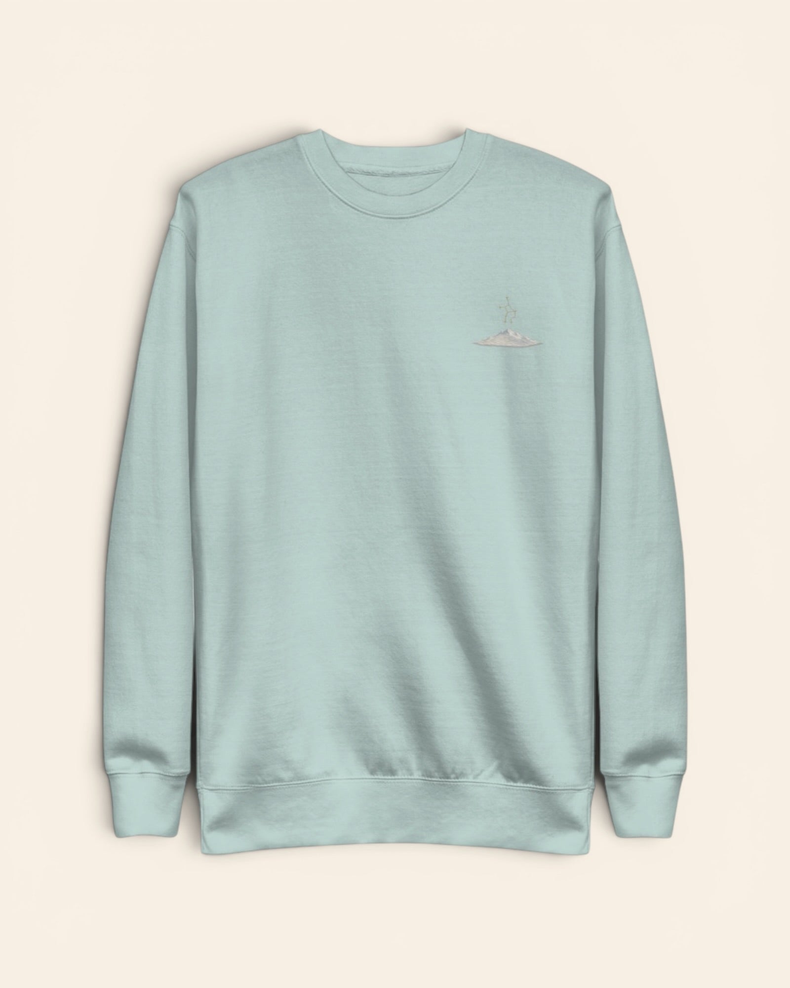 Virgo constellation crewneck sweatshirt with embroidered stars above a mountain ridge