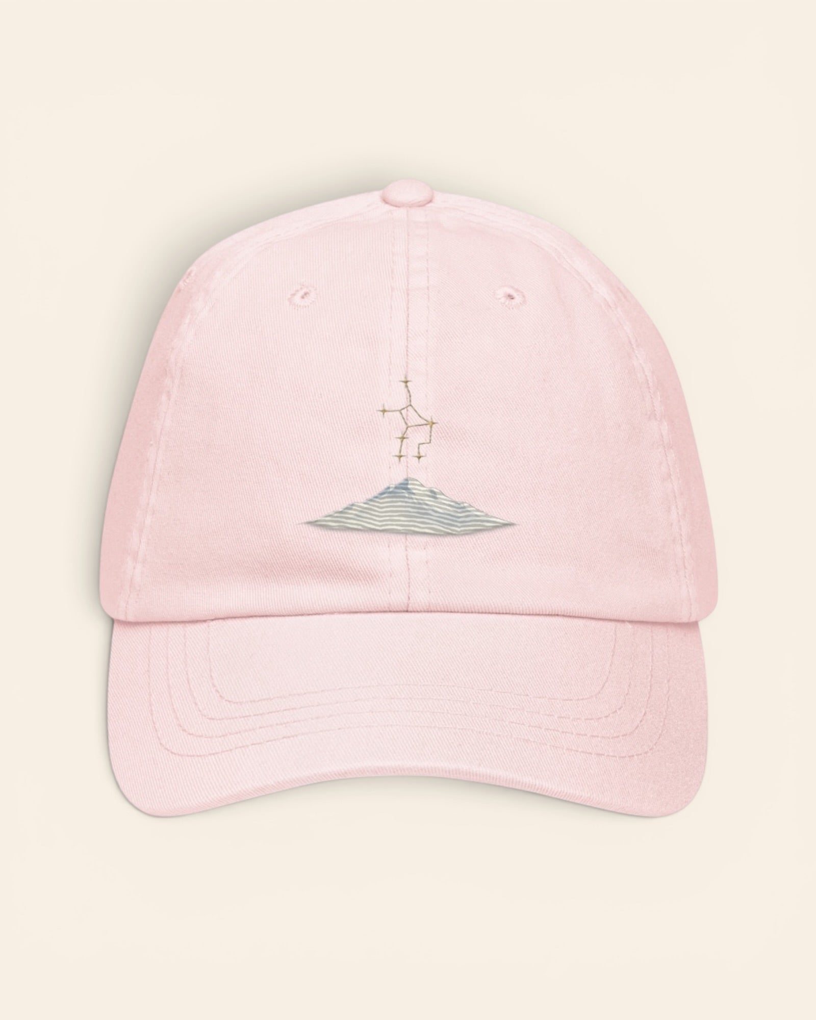 Virgo constellation hat with embroidered stars above a mountain ridge, in Pastel Pink
