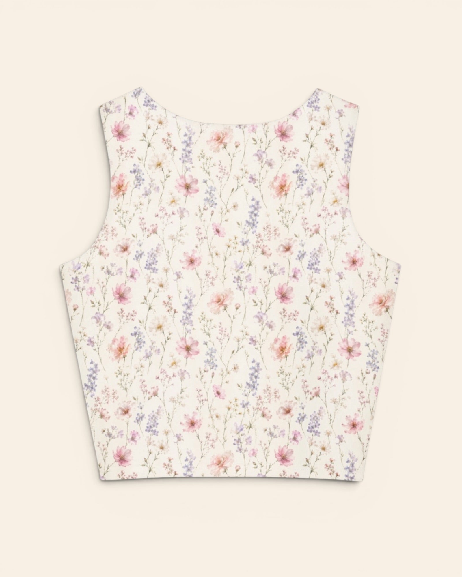 The Wildflower Theory Crop Top, with blush cosmos, cottage roses, larkspur, and baby's breath print