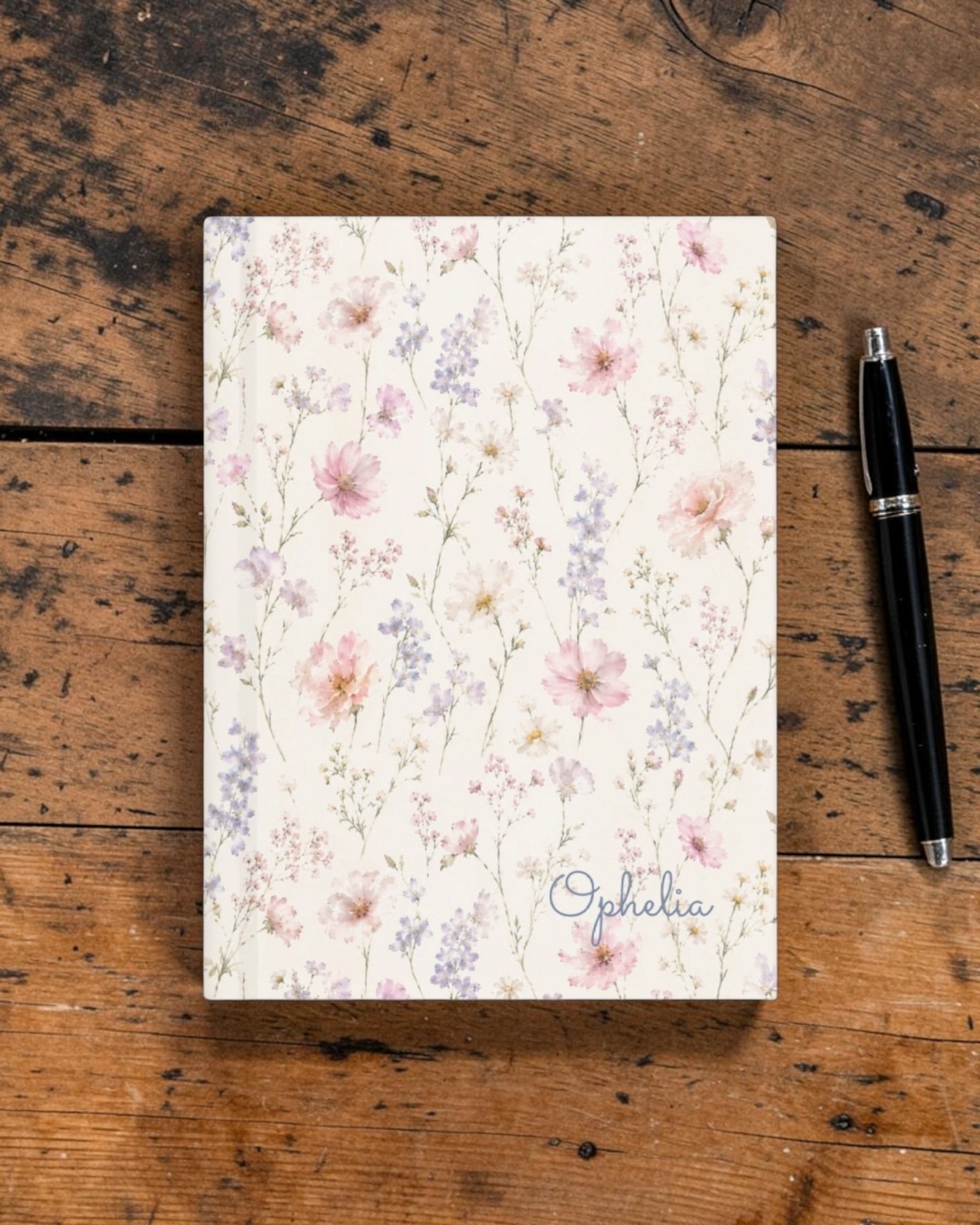 The Wildflower Theory Journal, with blush cosmos, cottage roses, larkspur, and baby's breath print