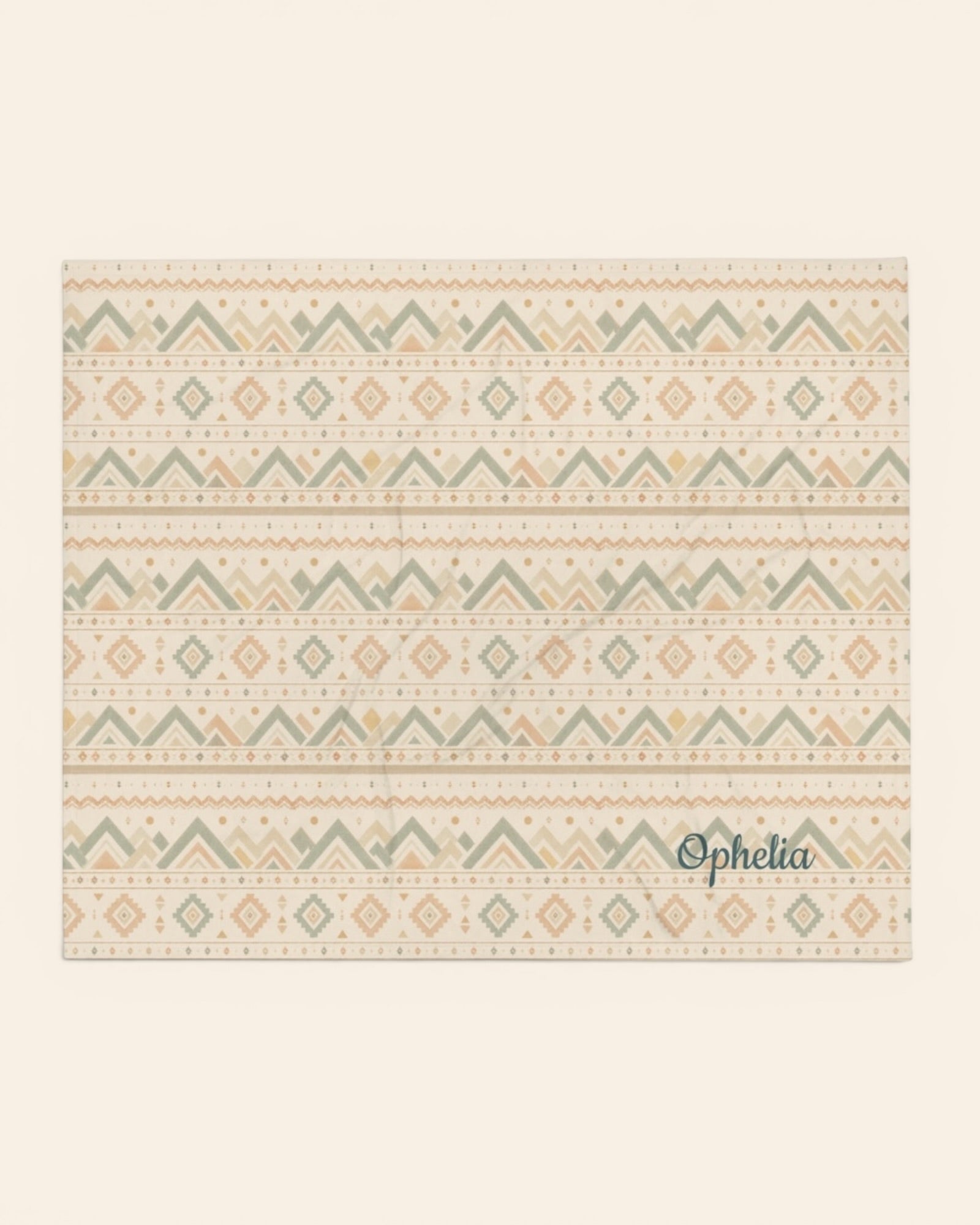 Where The Mountains Wait Throw Blanket, with mountain-inspired geometric bands in sage, sand, and peach print