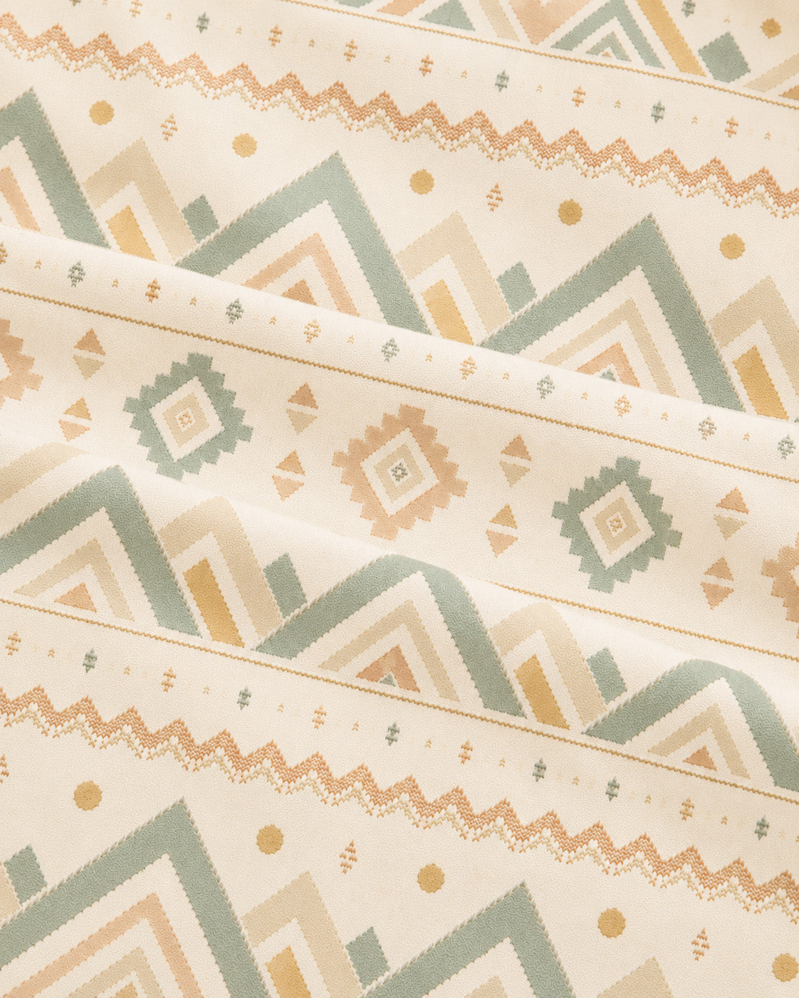 Where The Mountains Wait Crop Top, with mountain-inspired geometric bands in sage, sand, and peach print