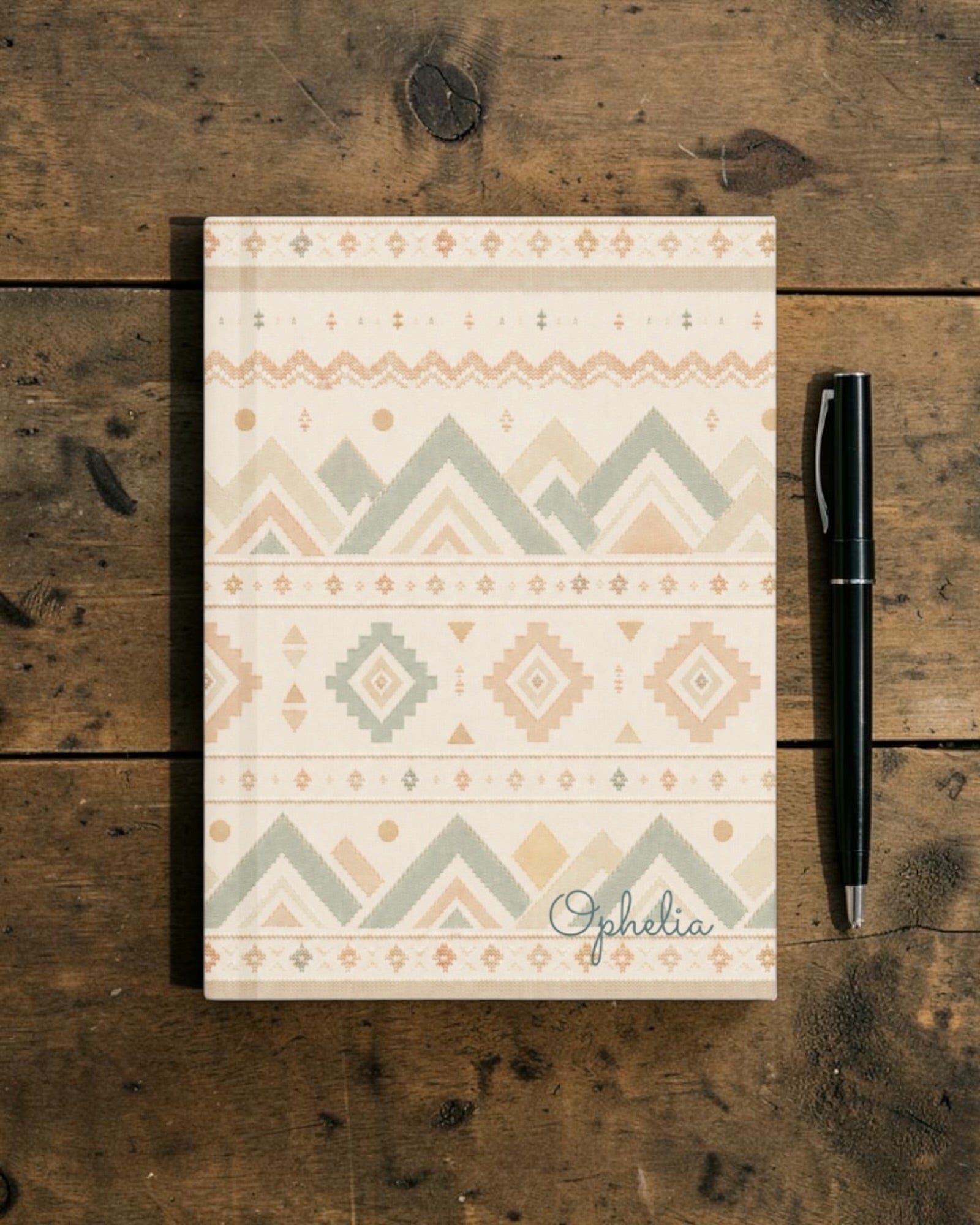 Where The Mountains Wait Journal, with mountain-inspired geometric bands in sage, sand, and peach print