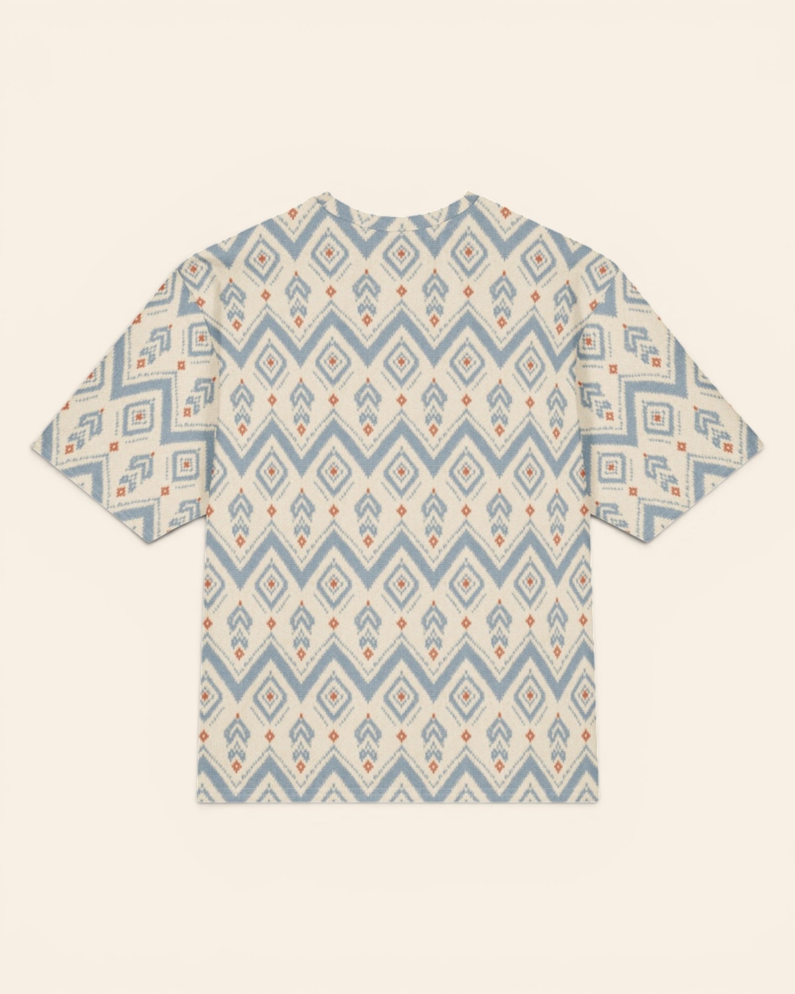 The Alpine Hours Oversized Tee, with mountain-inspired diamonds and rust accents print