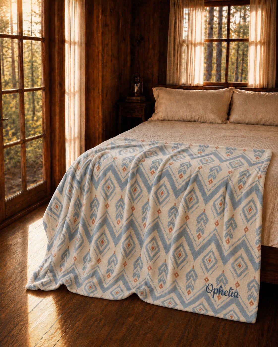 The Alpine Hours Throw Blanket, with mountain-inspired diamonds and rust accents print