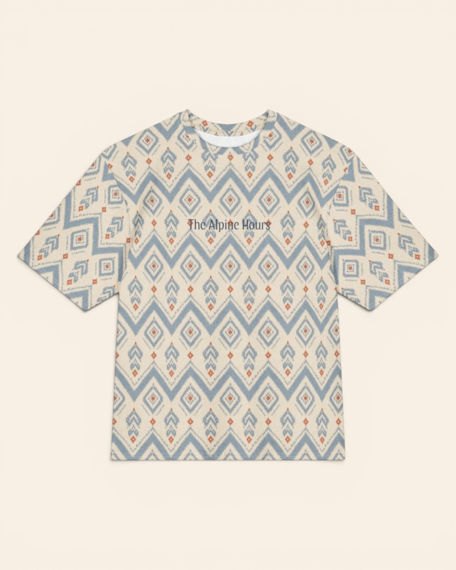 The Alpine Hours Oversized Tee, with mountain-inspired diamonds and rust accents print