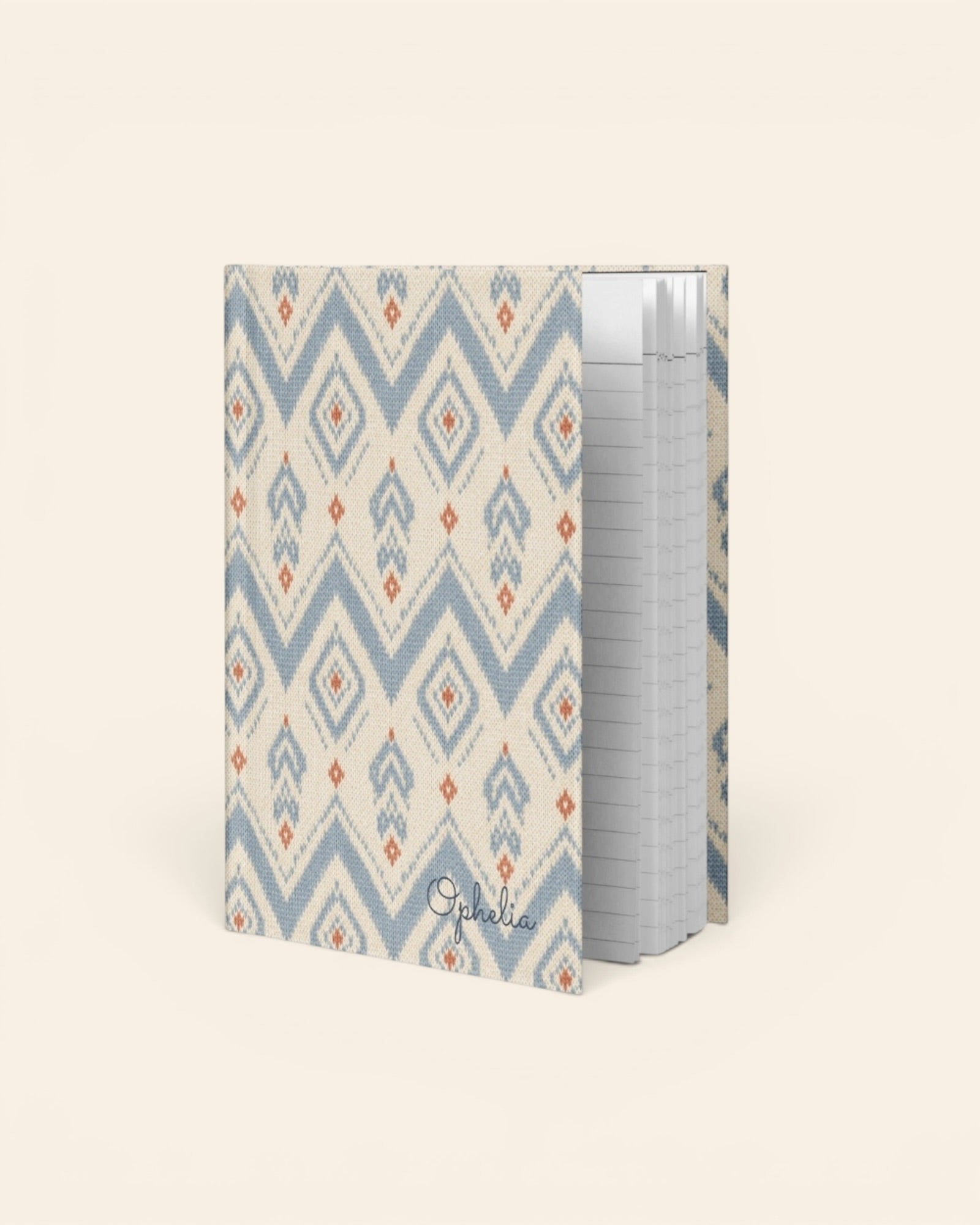 The Alpine Hours Journal, with mountain-inspired diamonds and rust accents print