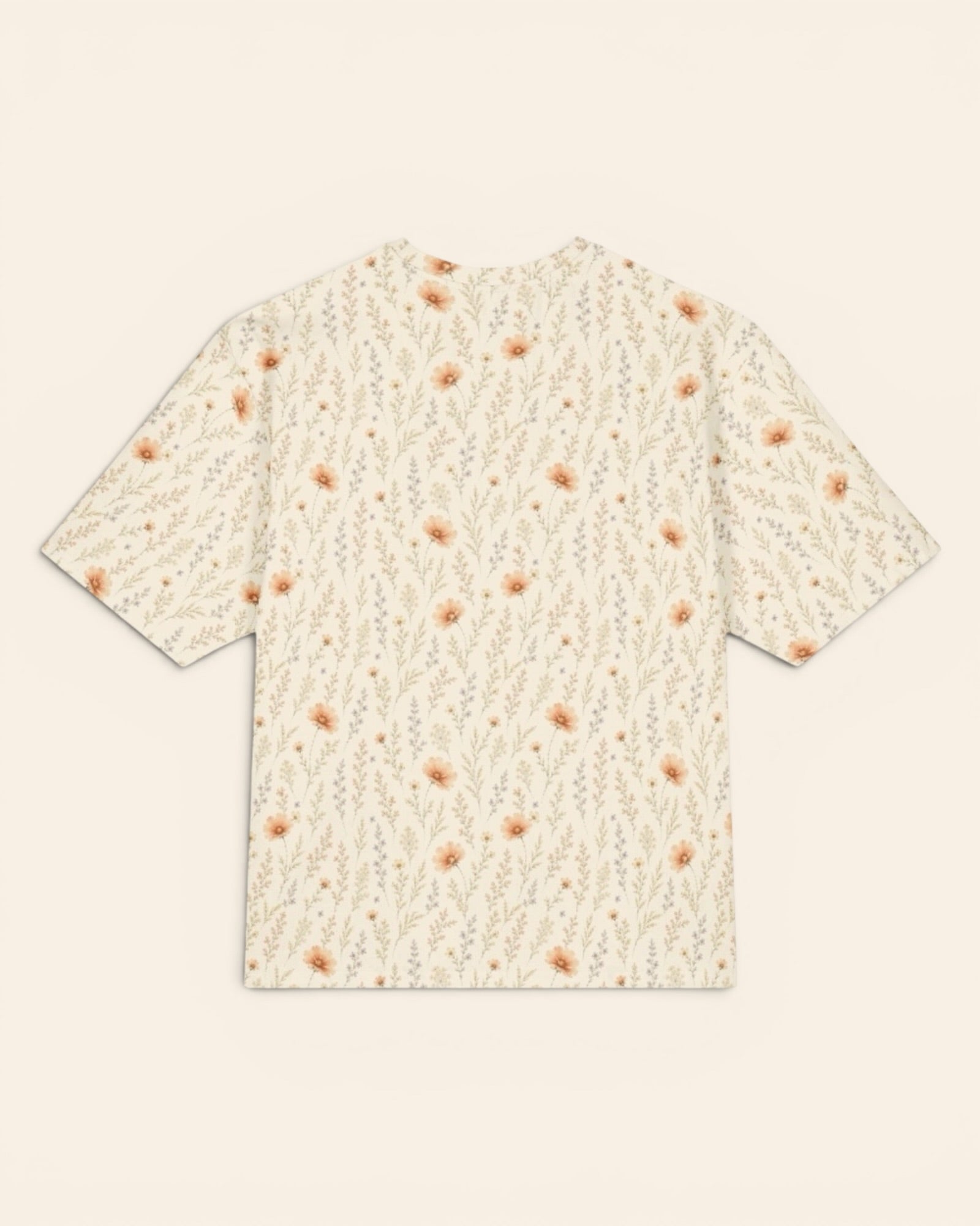 Wildflower Dreams Oversized Tee, with apricot cosmos, larkspur, baby's breath, and golden stems print