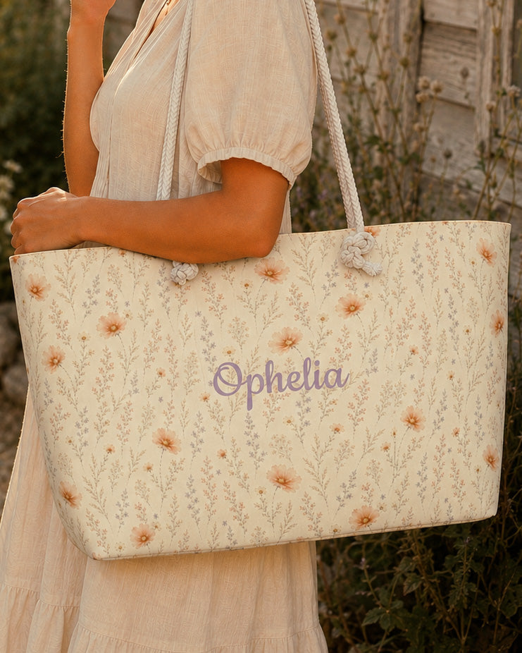 Wildflower Dreams Weekender Bag, with apricot cosmos, larkspur, baby's breath, and golden stems print