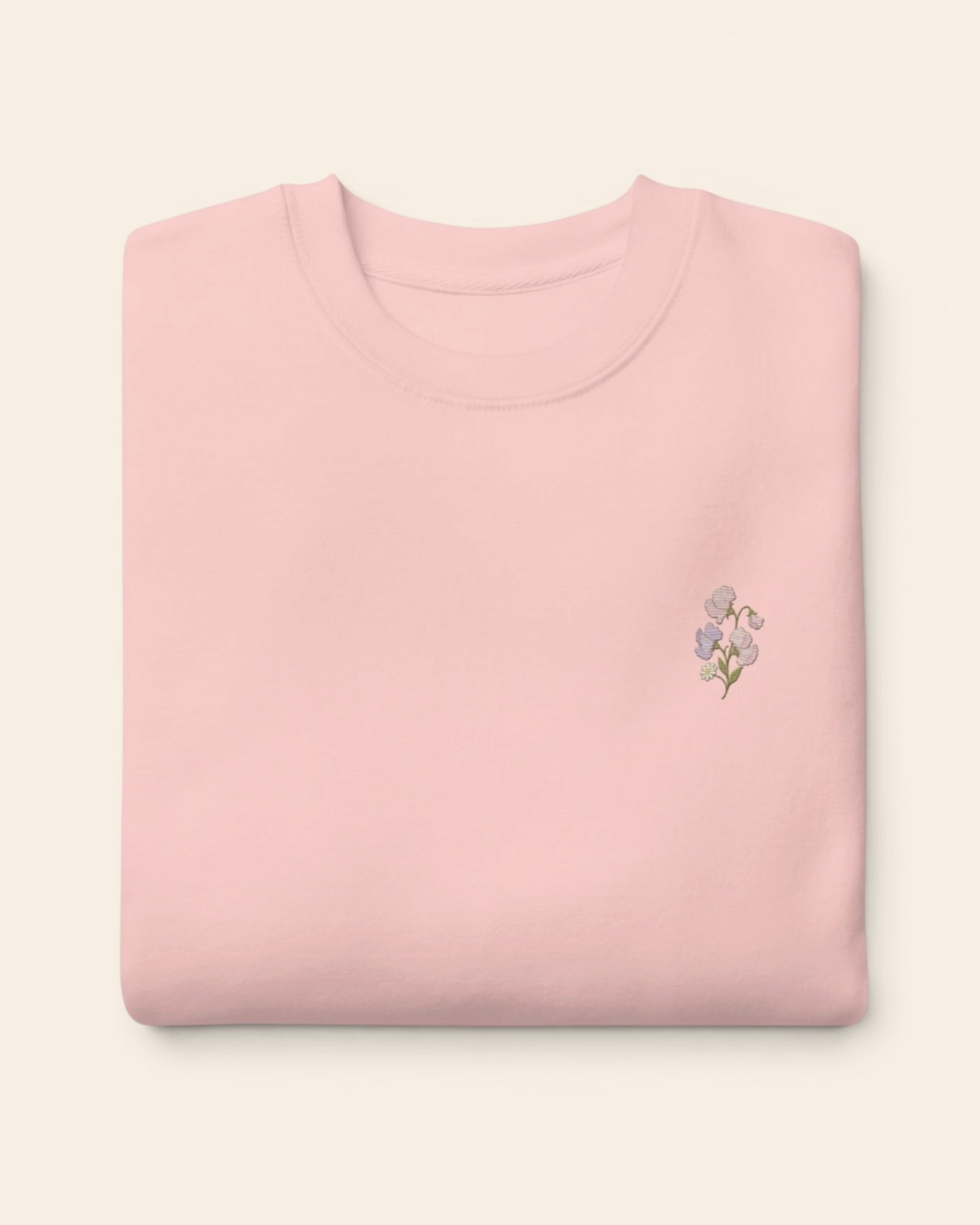 April birth flower crewneck sweatshirt with embroidered sweet pea and daisy, in Light Pink