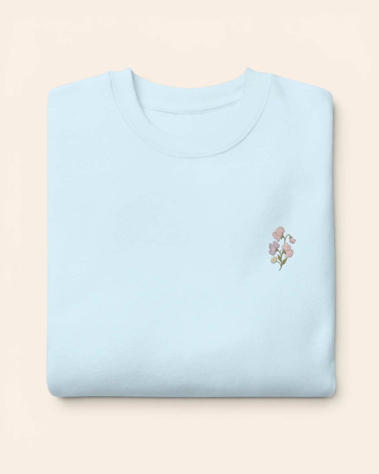 April birth flower crewneck sweatshirt with embroidered sweet pea and daisy, in Sky Blue