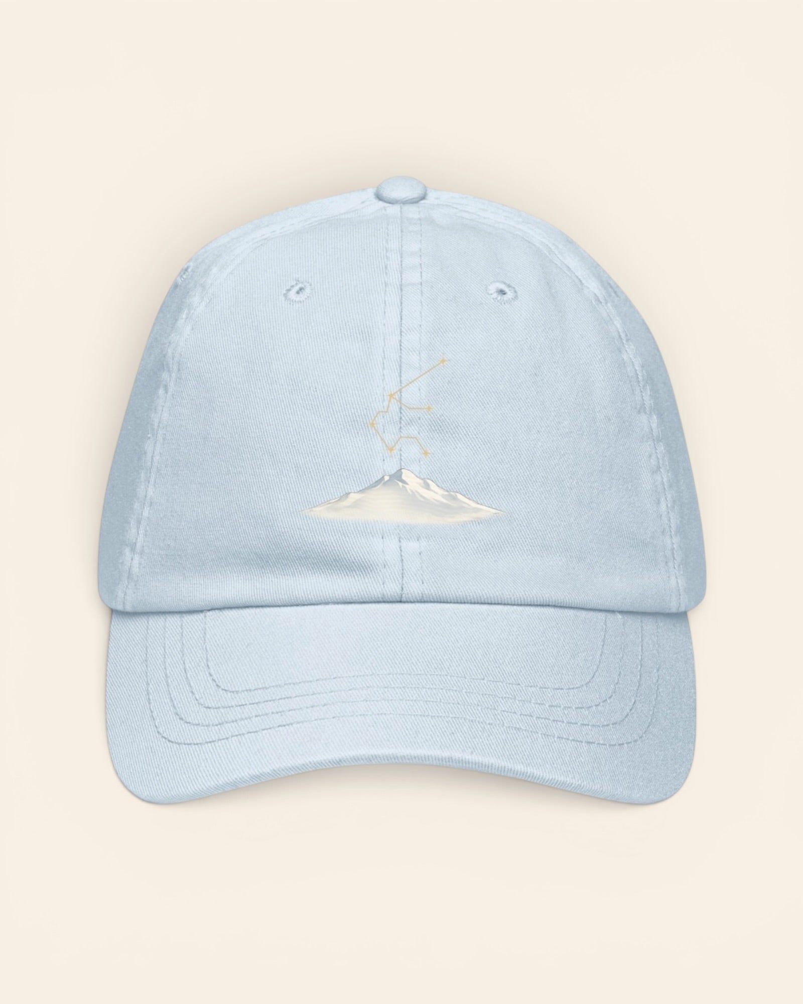 Aquarius constellation hat with embroidered stars above a mountain ridge, in Pastel Blue