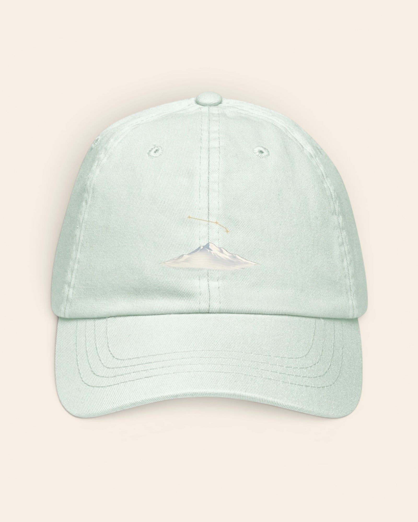 Aries constellation hat with embroidered stars above a mountain ridge, in Pastel Mint