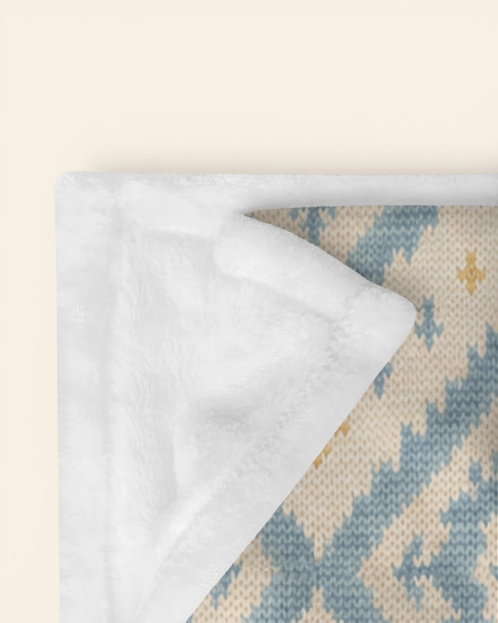 A Place Between The Peaks Throw Blanket, with dusty blue ikat-inspired diamonds and soft golden accents print