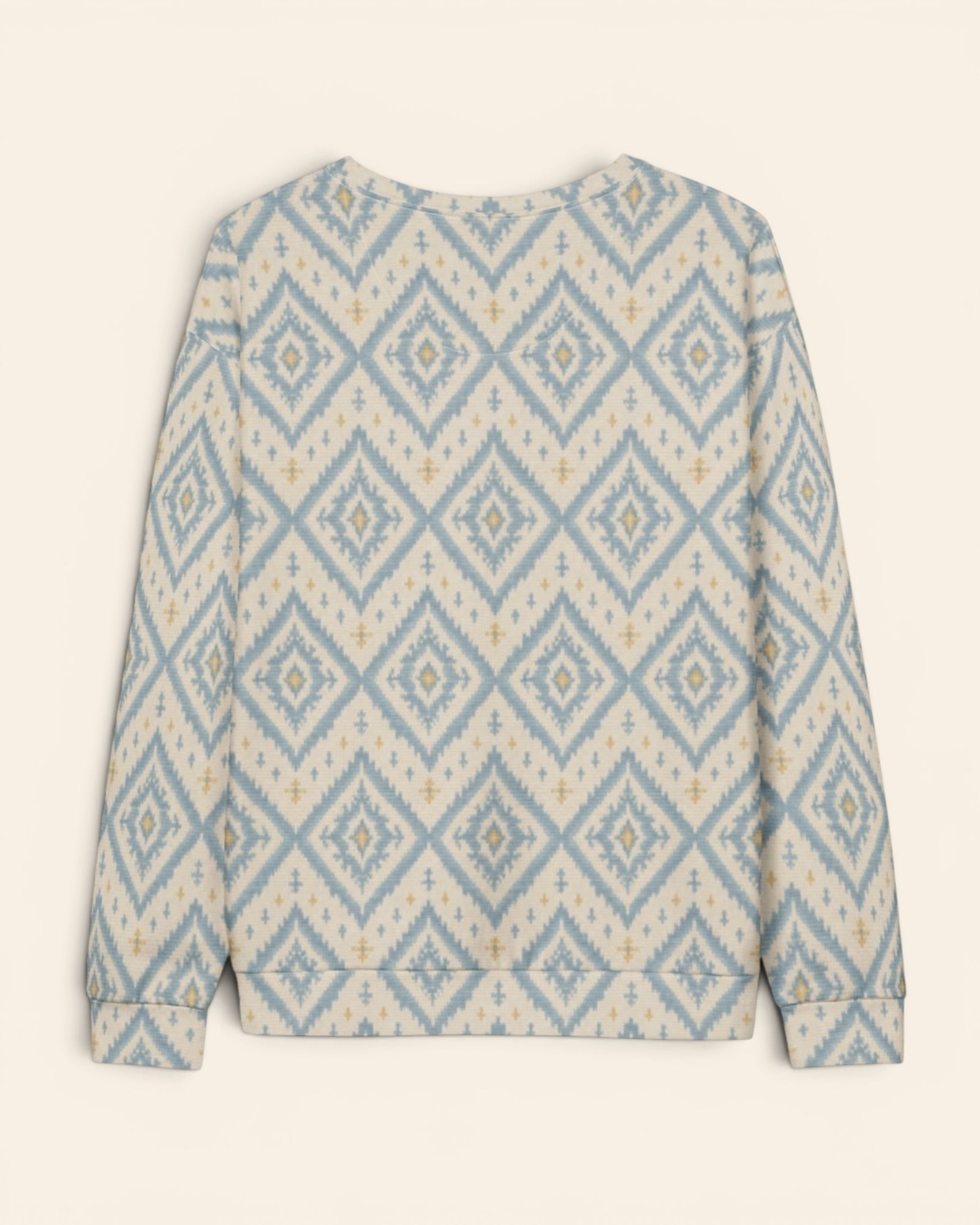 A Place Between The Peaks Crewneck Sweatshirt, with dusty blue ikat-inspired diamonds and soft golden accents print