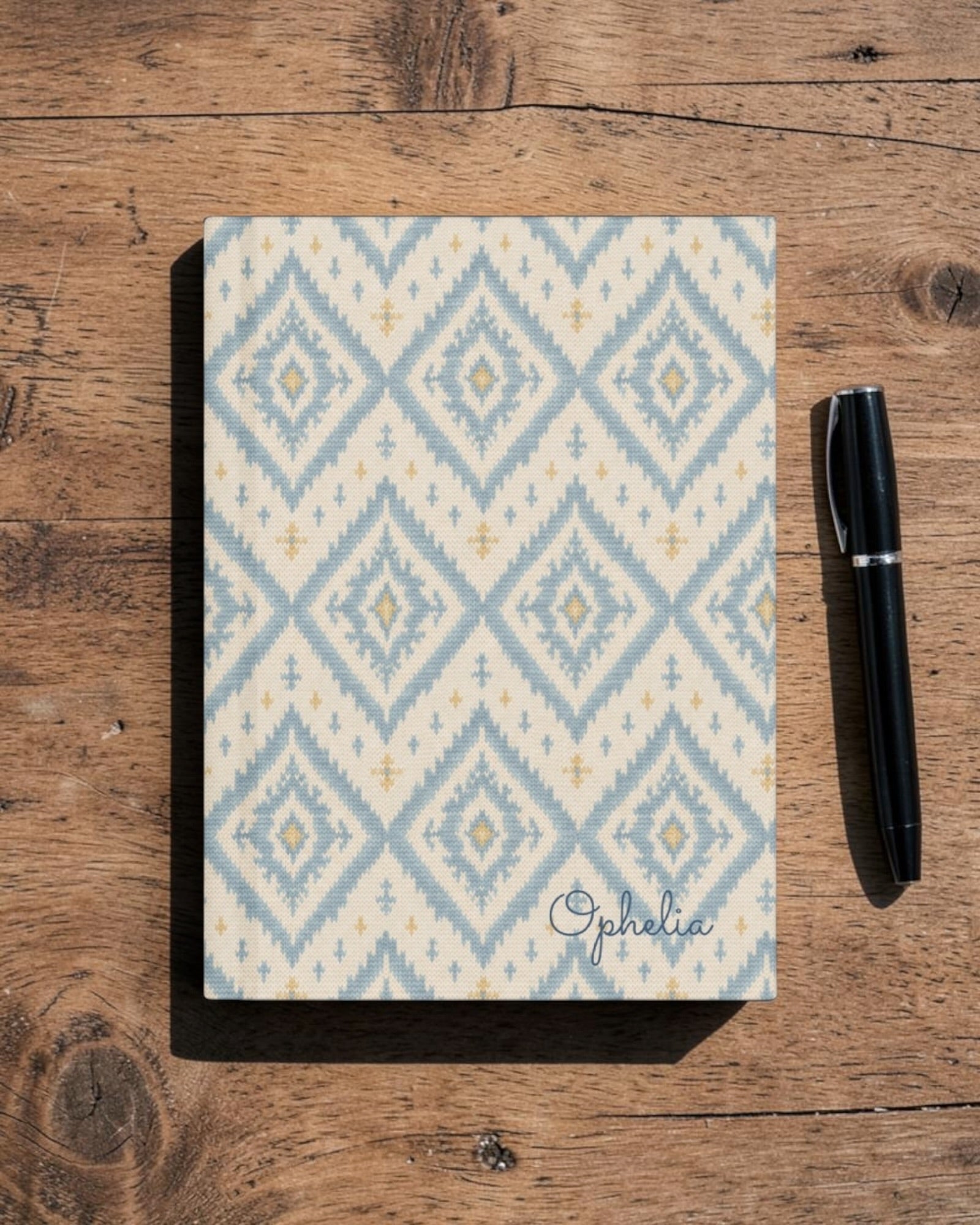 A Place Between The Peaks Journal, with dusty blue ikat-inspired diamonds and soft golden accents print