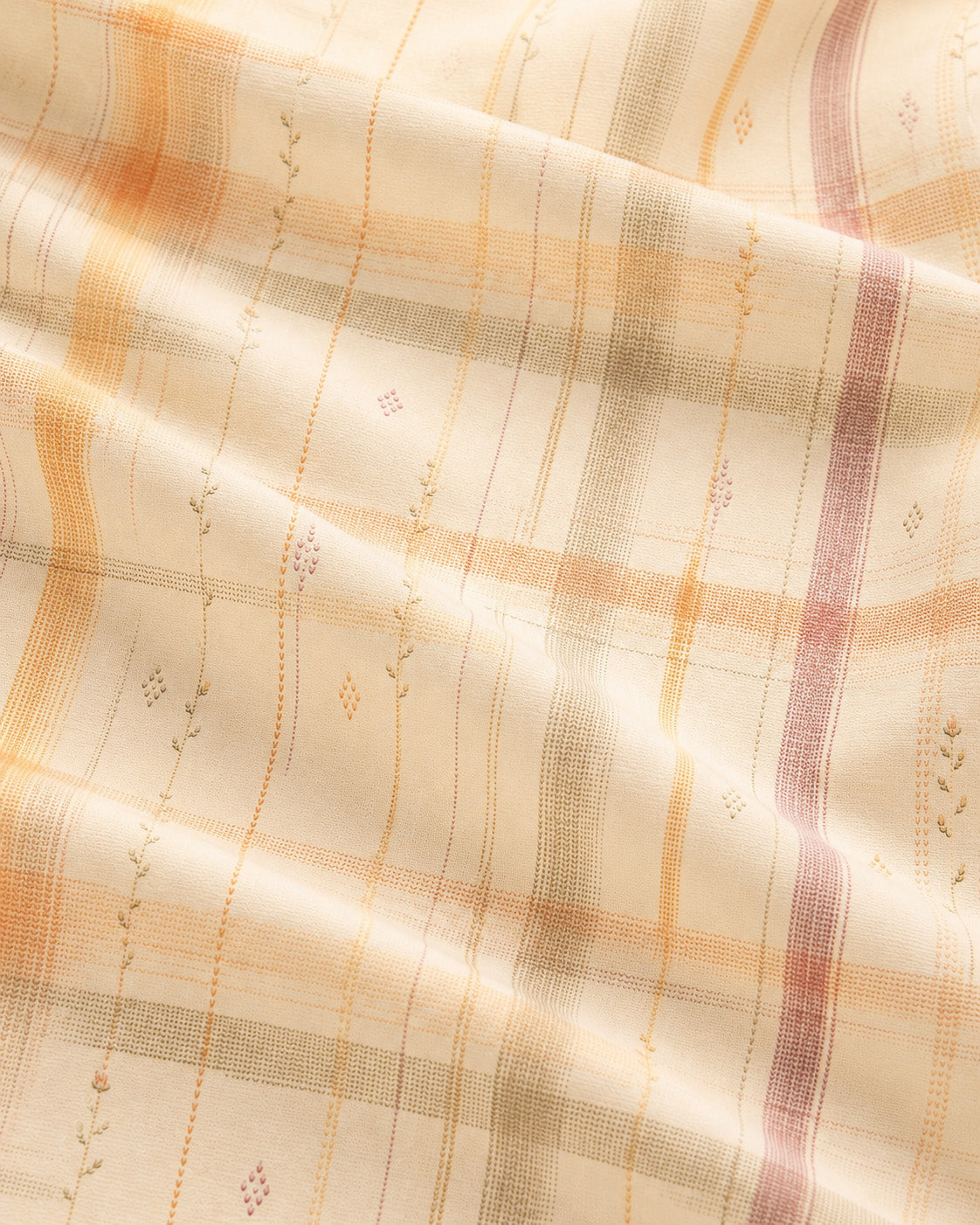 Written By The Wilderness Oversized Tee, with vintage-inspired woven plaid in apricot, sage, and peach print