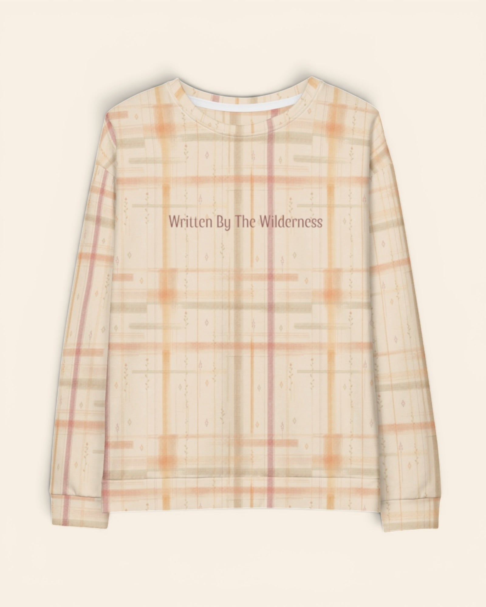 Written By The Wilderness Crewneck Sweatshirt, with vintage-inspired woven plaid in apricot, sage, and peach print