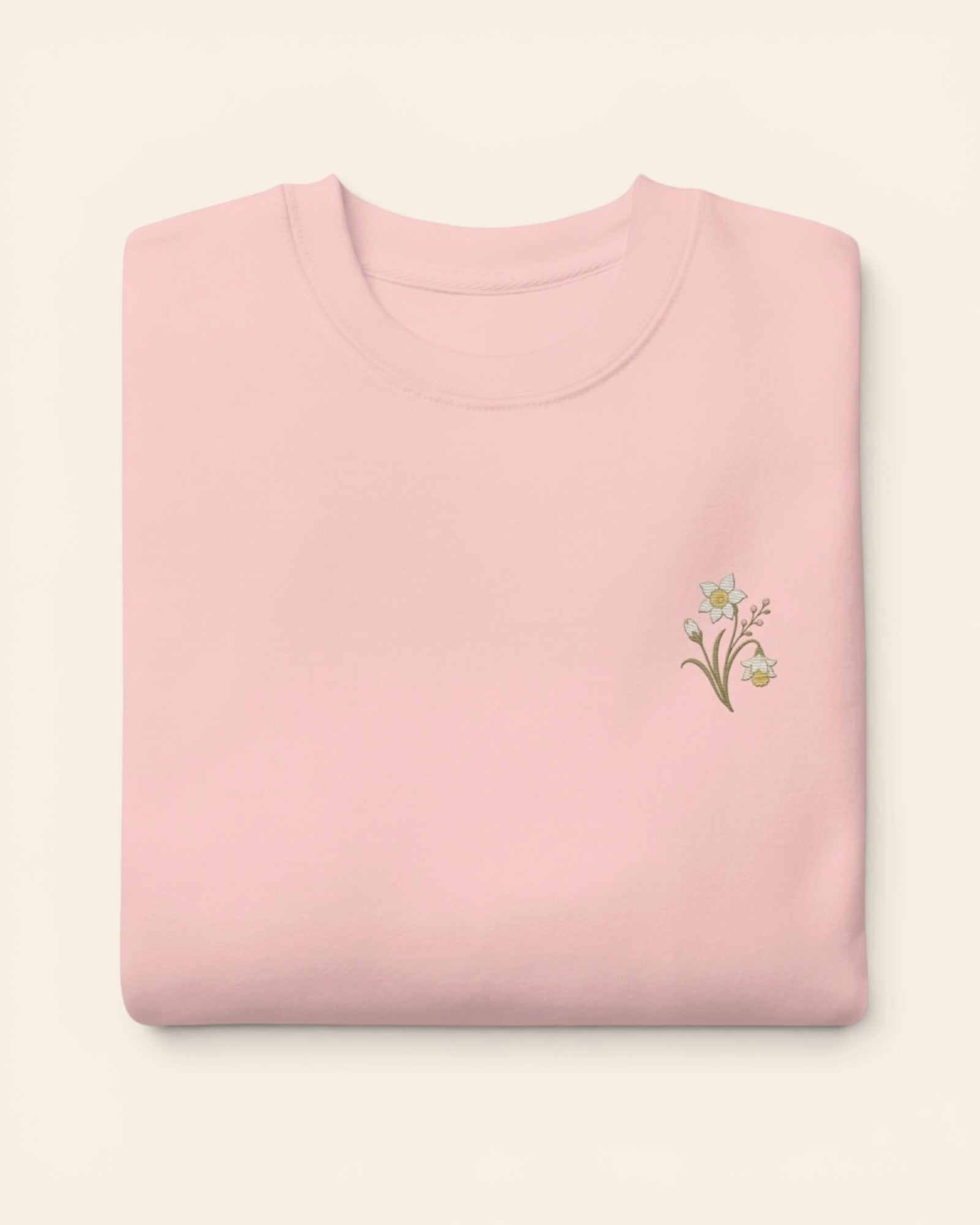 December birth flower crewneck sweatshirt with embroidered narcissus and holly, in Light Pink