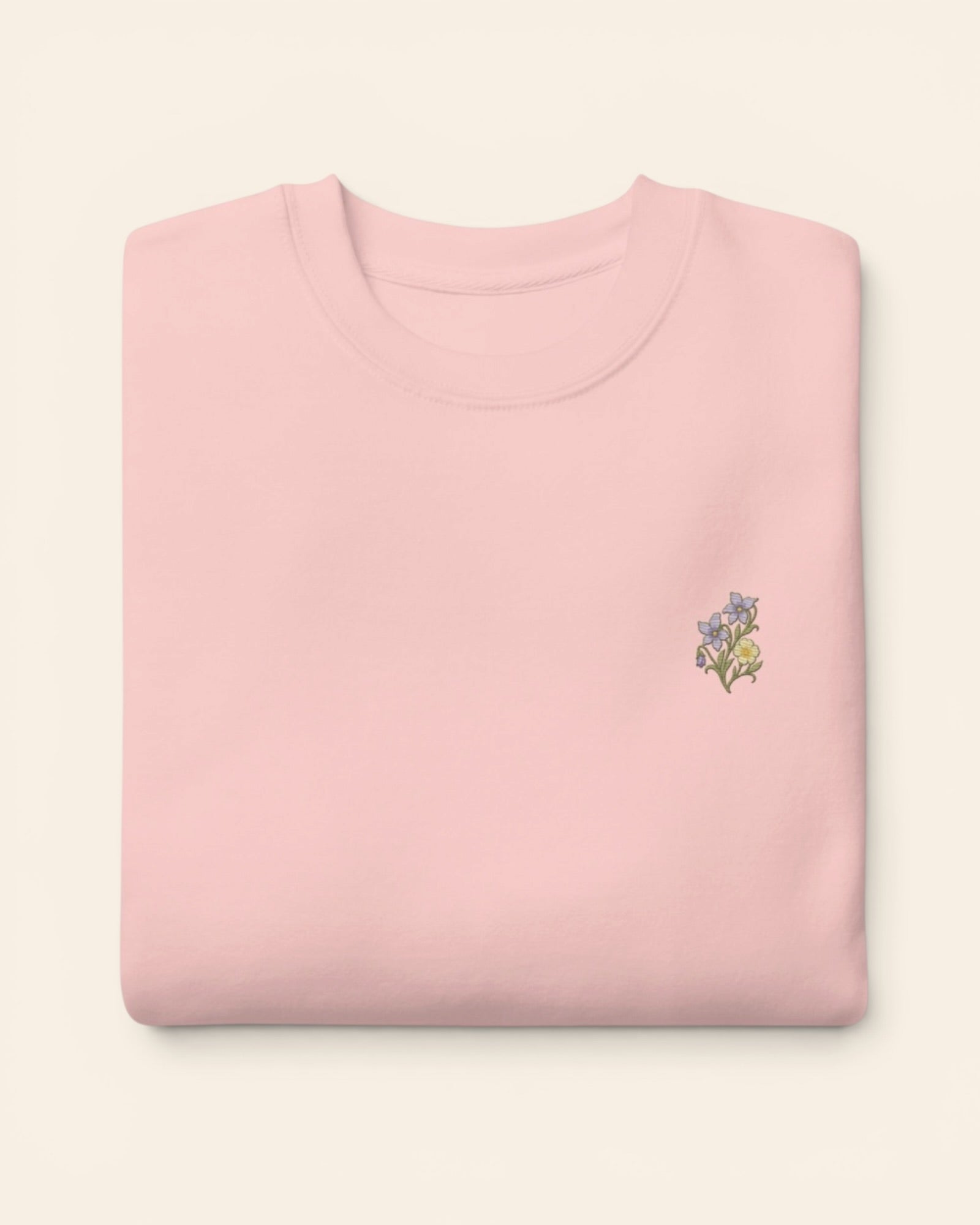 February birth flower crewneck sweatshirt with embroidered violet and primrose, in Light Pink