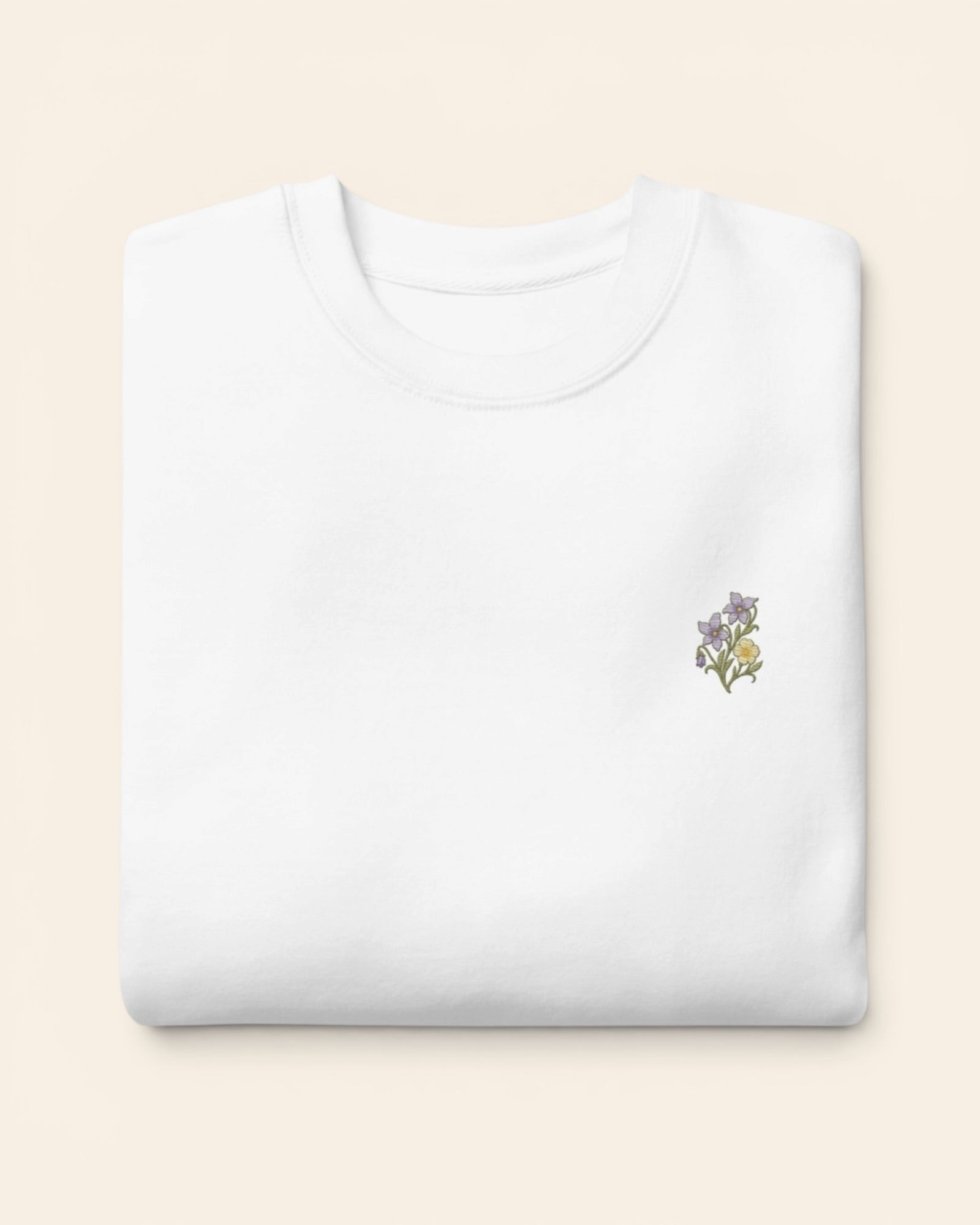 February birth flower crewneck sweatshirt with embroidered violet and primrose, in White