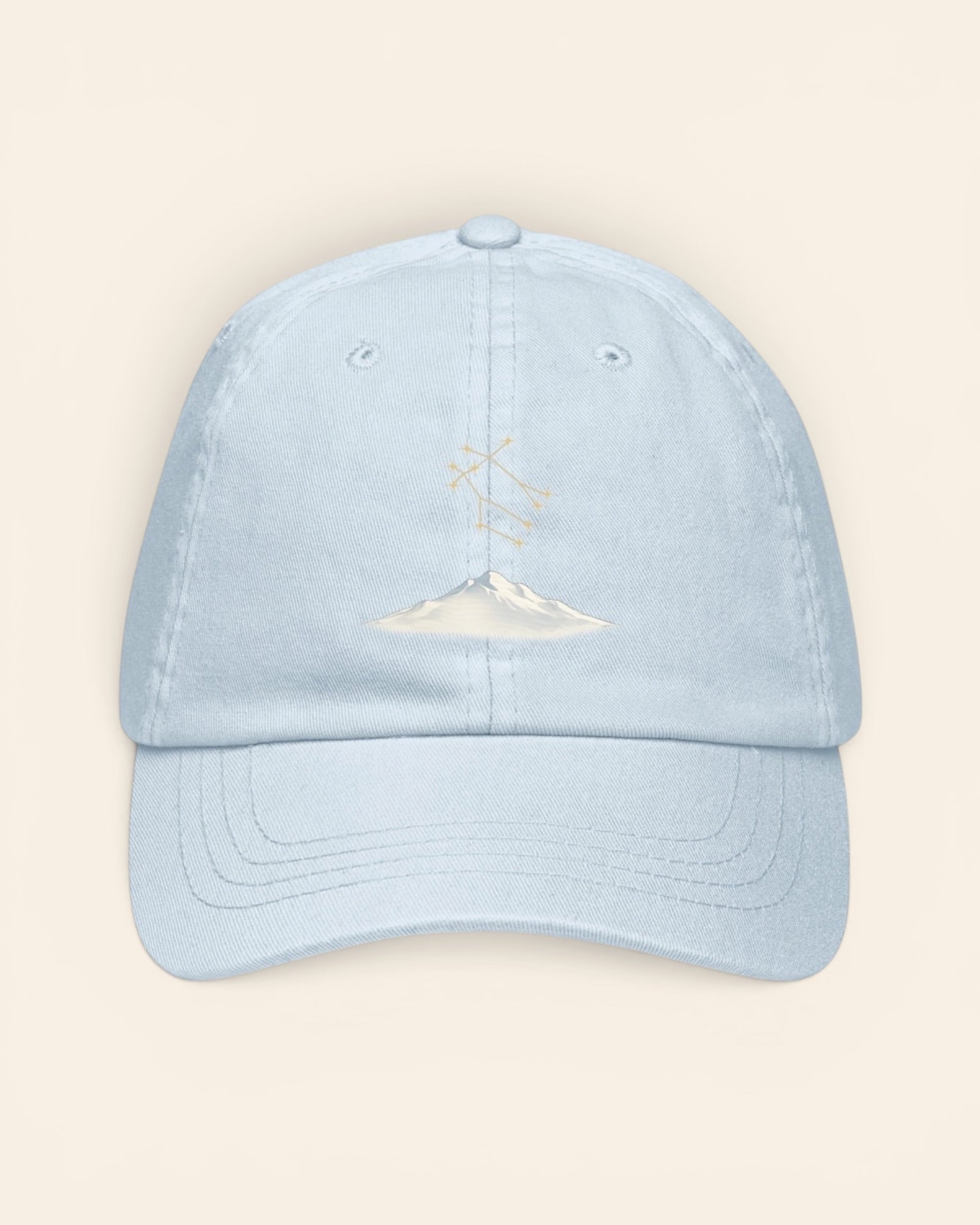 Gemini constellation hat with embroidered stars above a mountain ridge, in Pastel Blue