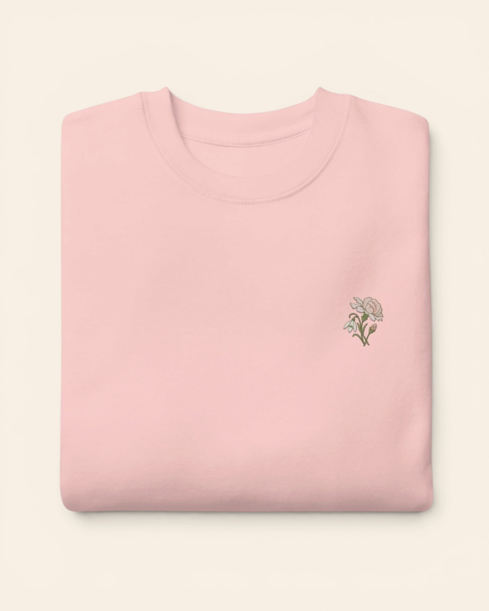 January birth flower crewneck sweatshirt with embroidered carnation and snowdrop, in Light Pink