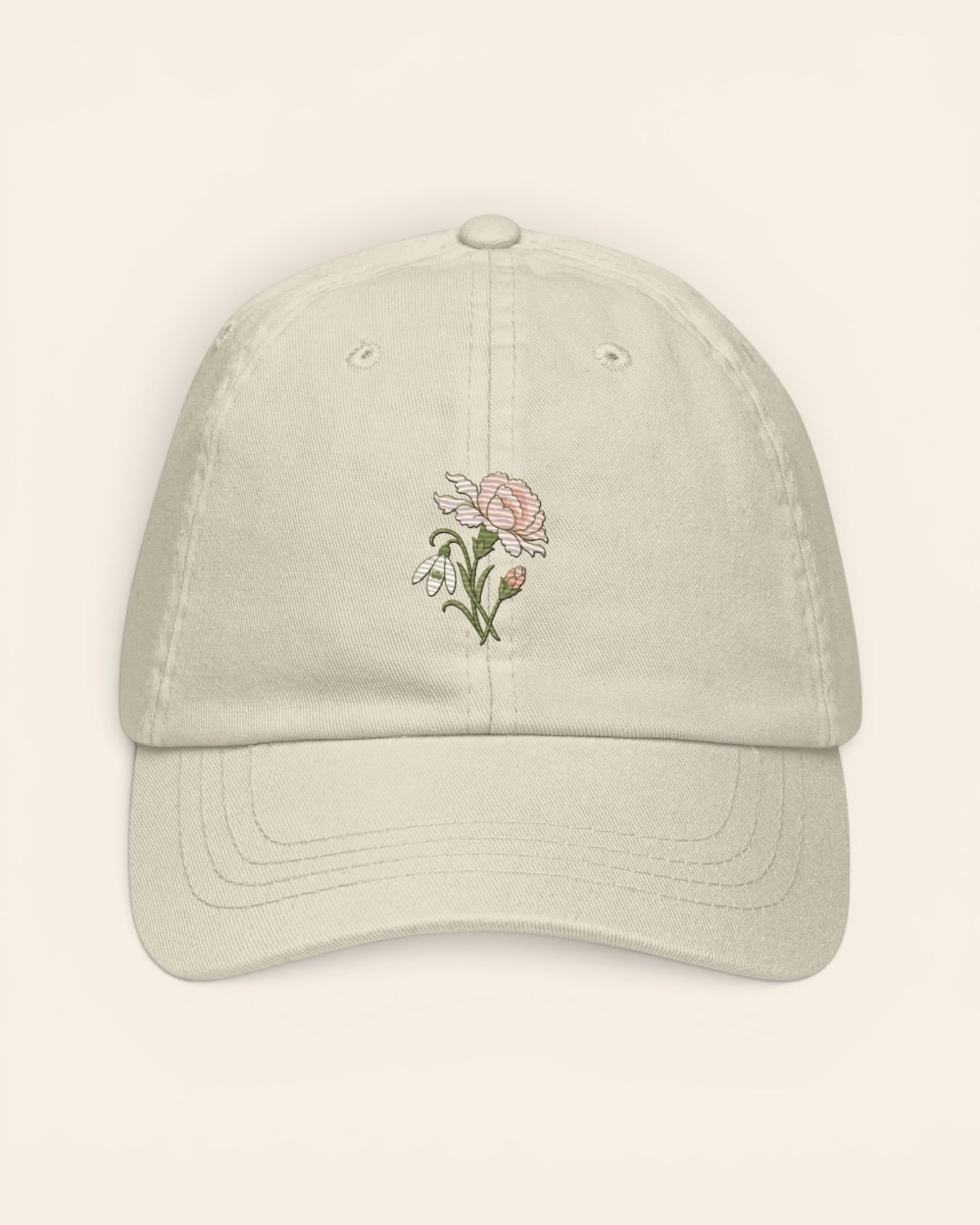 January birth flower hat with embroidered carnation and snowdrop, in Beige