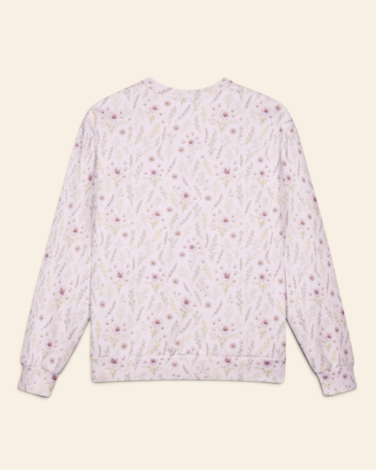 The same crewneck shown flat from the back on a plain cream background, with no text, so the all-over print runs unbroken across the body and sleeves. It is white, printed with lavender and mauve wildflowers on slender stems.