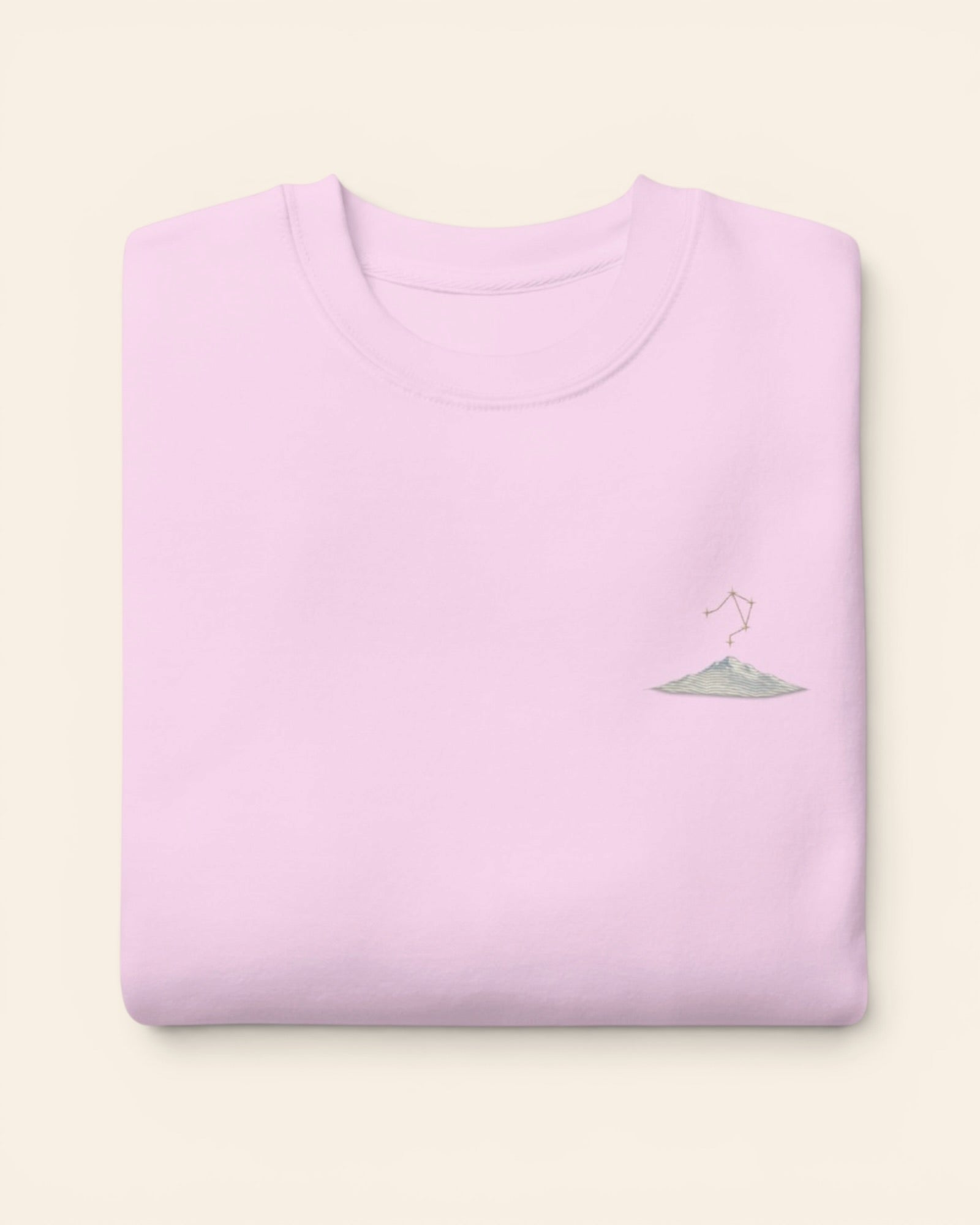 Libra constellation crewneck sweatshirt with embroidered stars above a mountain ridge, in Lavender