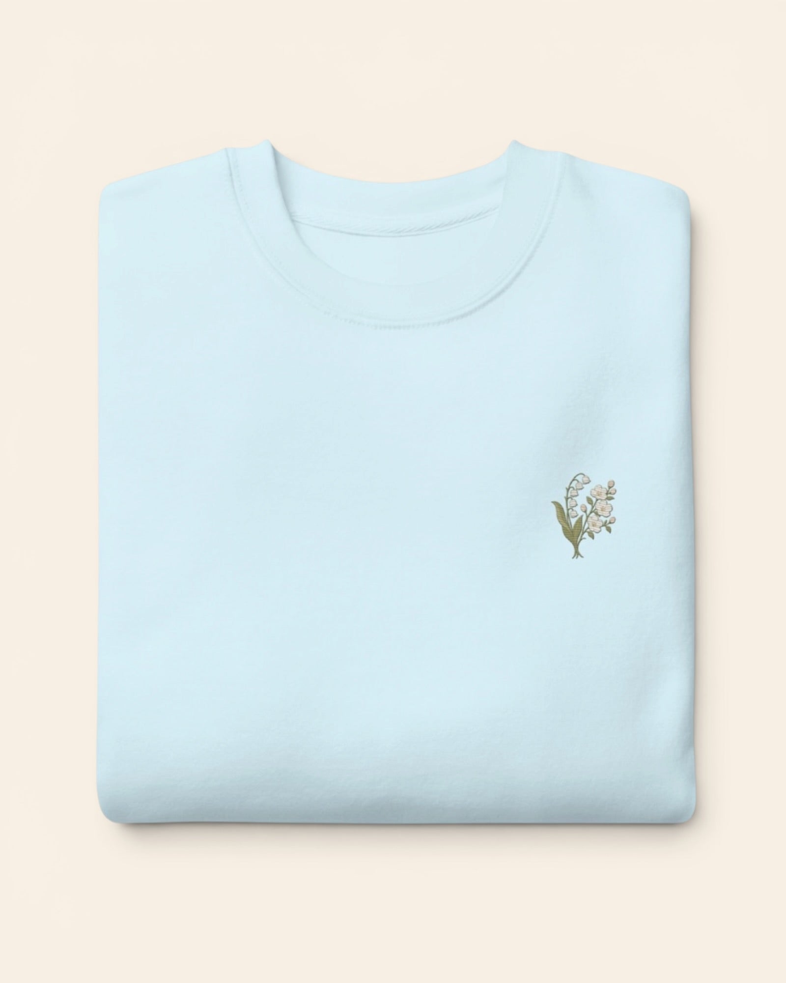 May birth flower crewneck sweatshirt with embroidered lily of the valley and hawthorn, in Sky Blue