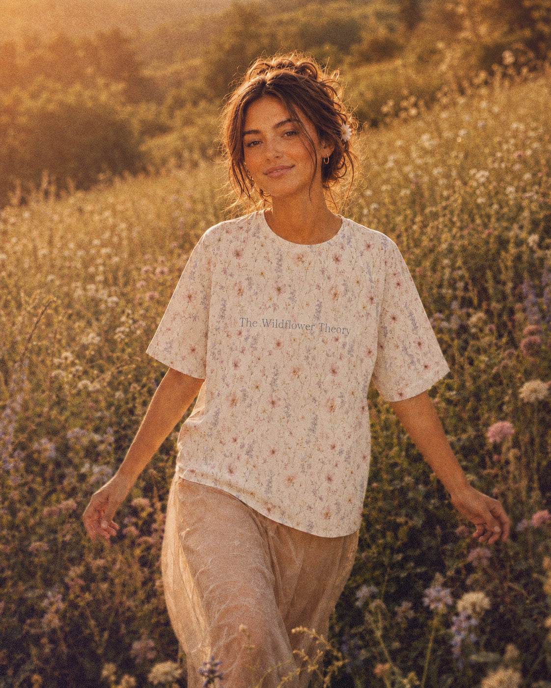 The Wildflower Theory Oversized Tee, with blush cosmos, cottage roses, larkspur, and baby's breath print