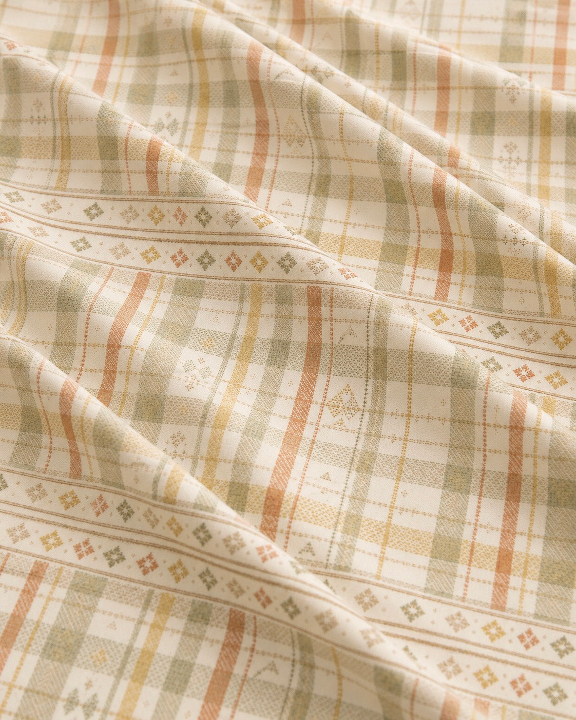 Woven Through The Wild Crop Top, with vintage woven plaid in sage, apricot, peach, and sand print