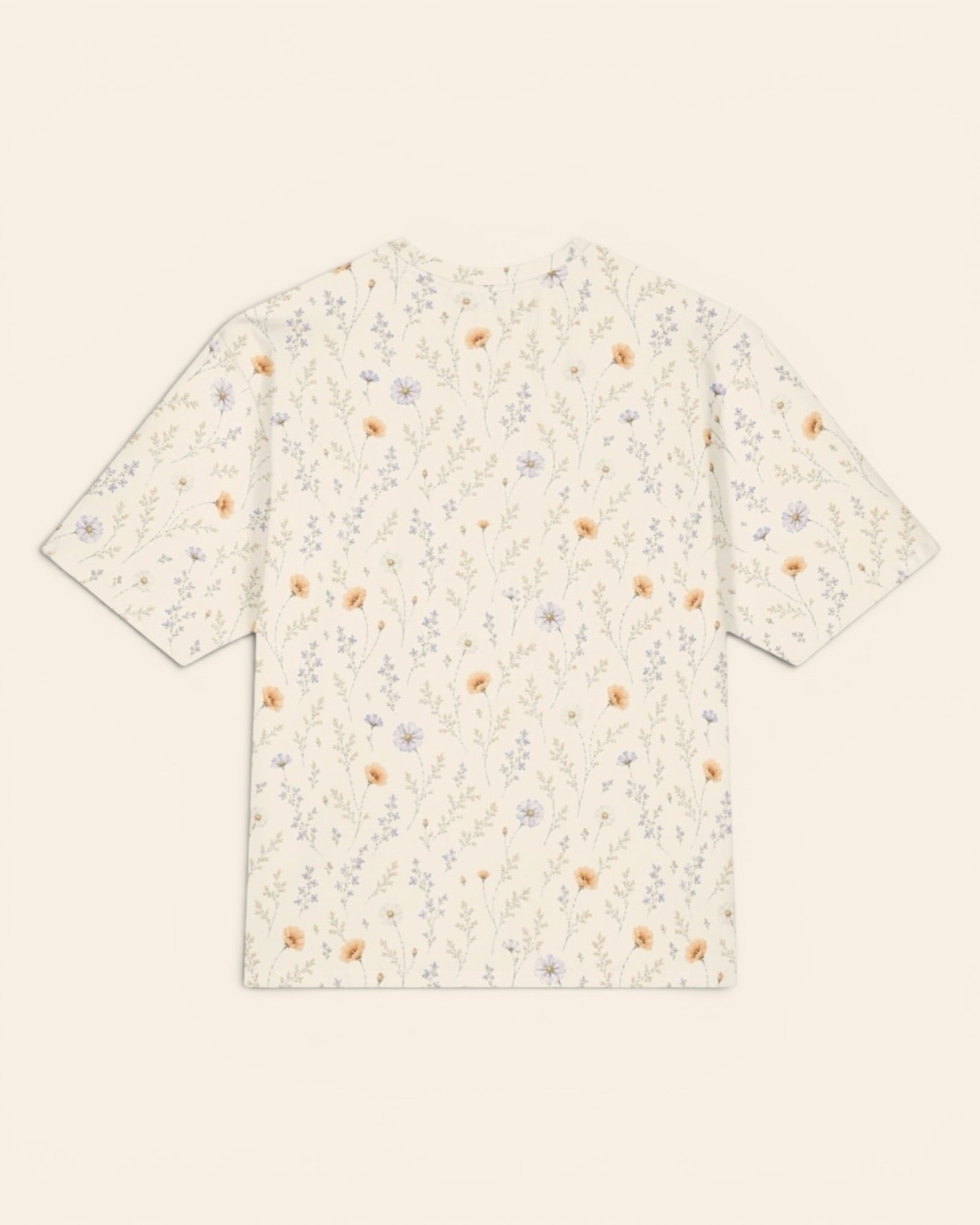 Garden Reverie Oversized Tee, with peach poppies, blue cosmos, forget-me-nots, and daisies print