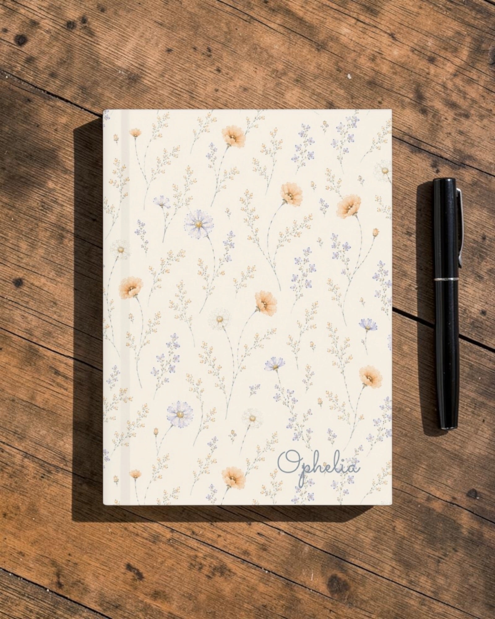 Garden Reverie Journal, with peach poppies, blue cosmos, forget-me-nots, and daisies print