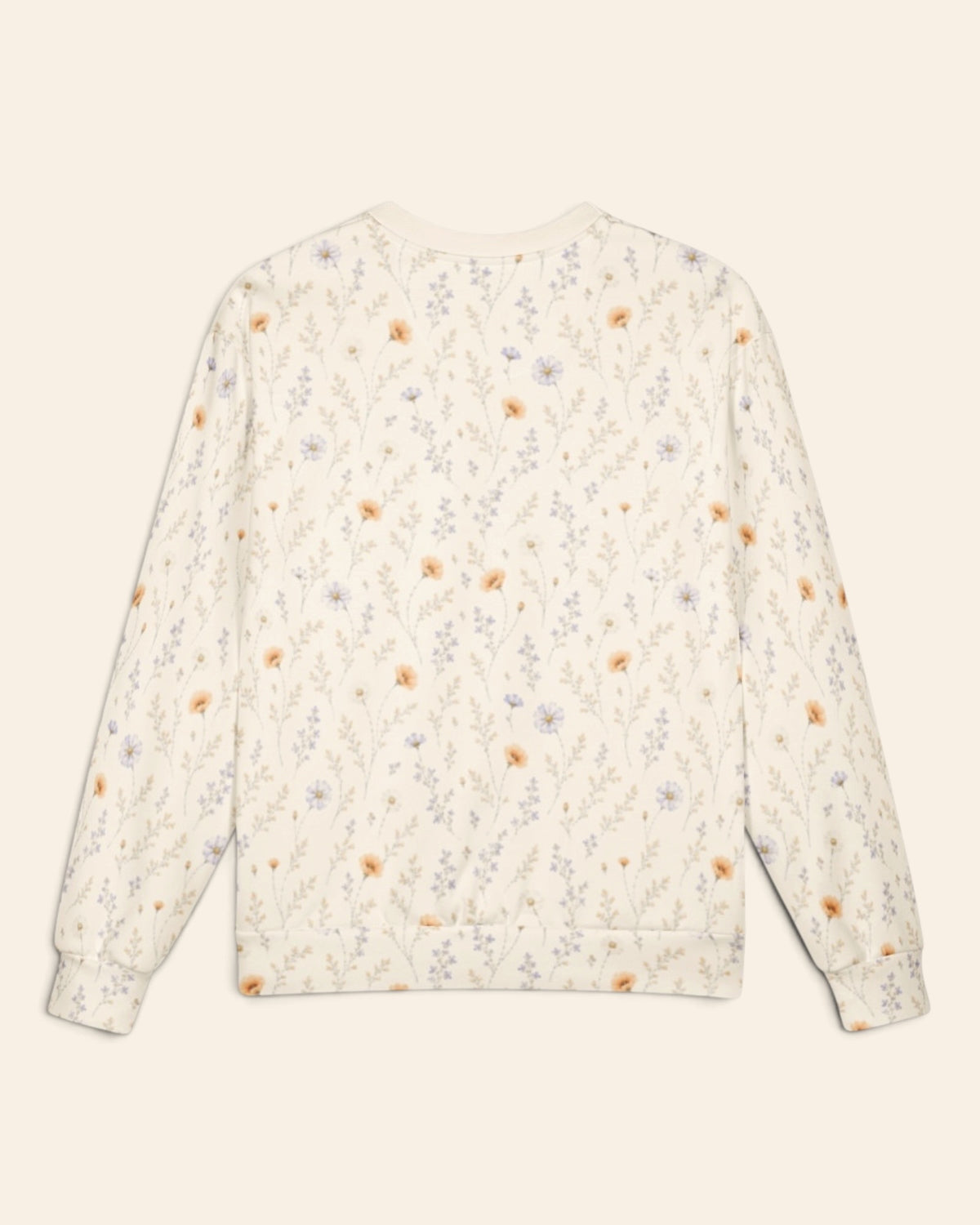 The same crewneck shown flat from the back on a plain cream background, with no text, so the all-over print runs unbroken across the body and sleeves. It is cream, scattered with small apricot poppies and lilac and periwinkle wildflowers on fine stems.