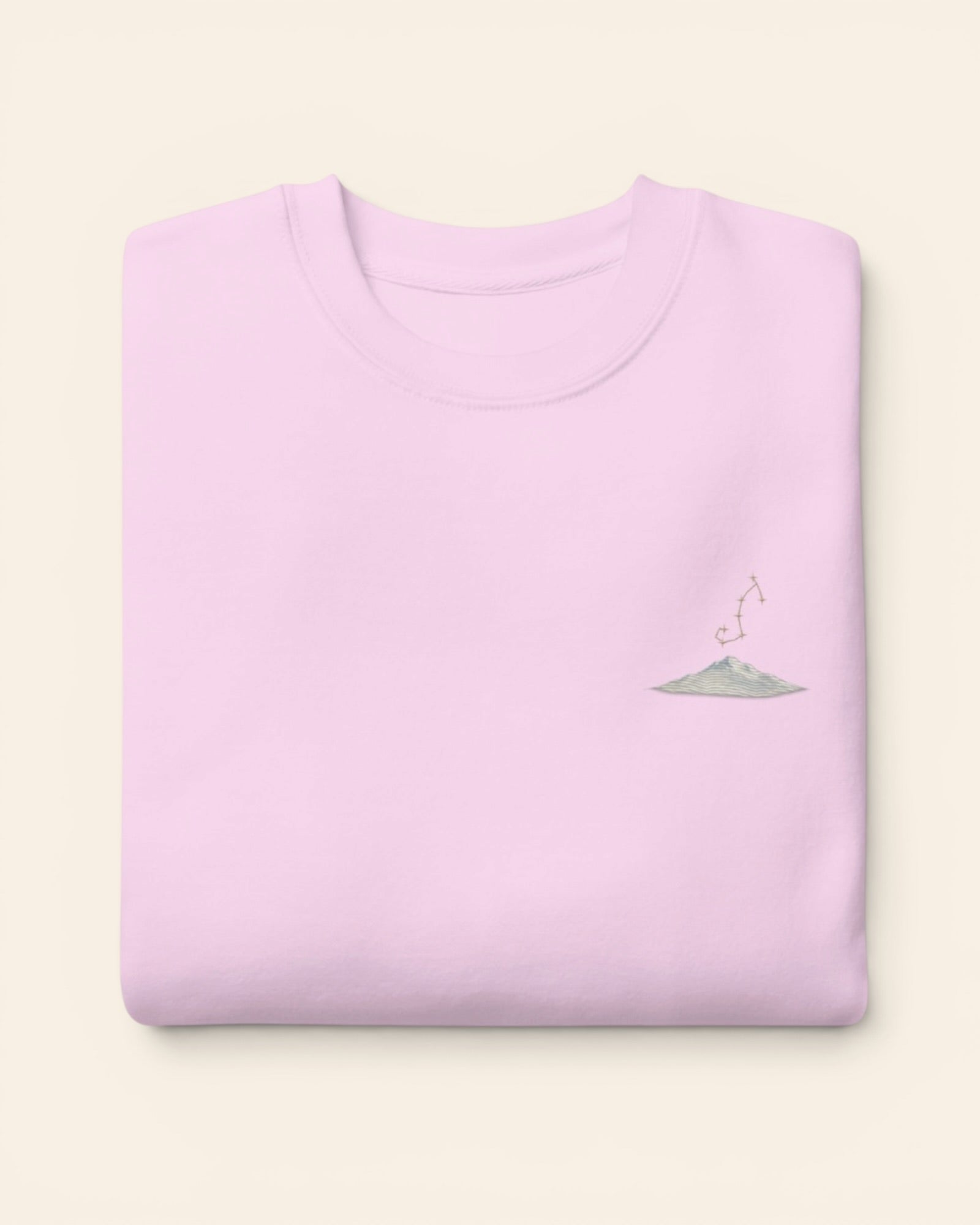 Scorpio constellation crewneck sweatshirt with embroidered stars above a mountain ridge, in Lavender